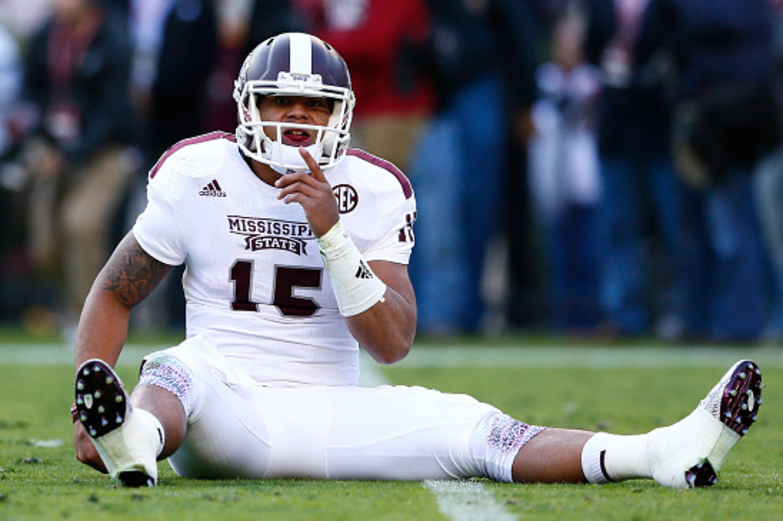 TUSCALOOSA, AL - NOVEMBER 15: Dak Prescott #15 of the Mississippi State Bulldogs reacts after an incomplete pass against the Alabama Crimson Tide at Bryant-Denny Stadium on November 15, 2014 in Tuscaloosa, Alabama. (Photo by Kevin C. Cox/Getty Images) TUSCALOOSA, AL - NOVEMBER 15: Dak Prescott #15 of the Mississippi State Bulldogs reacts after an incomplete pass against the Alabama Crimson Tide at Bryant-Denny Stadium on November 15, 2014 in Tuscaloosa, Alabama. (Photo by Kevin C. Cox/Getty Images)