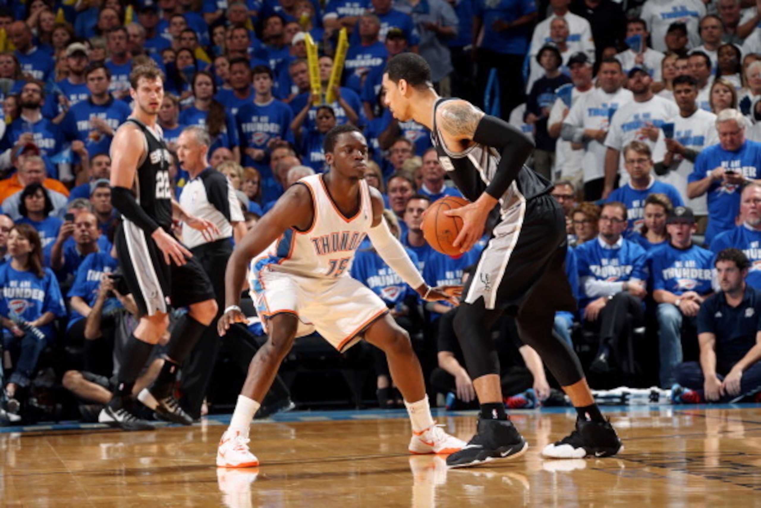 OKLAHOMA CITY, OK  MAY 27: Reggie Jackson #15 of the Oklahoma City Thunder guards his position against Danny Green #4 of the San Antonio Spurs in Game Four of the Western Conference Finals during the 2014 NBA Playoffs on May 27, 2014 at the Chesapeake Ene