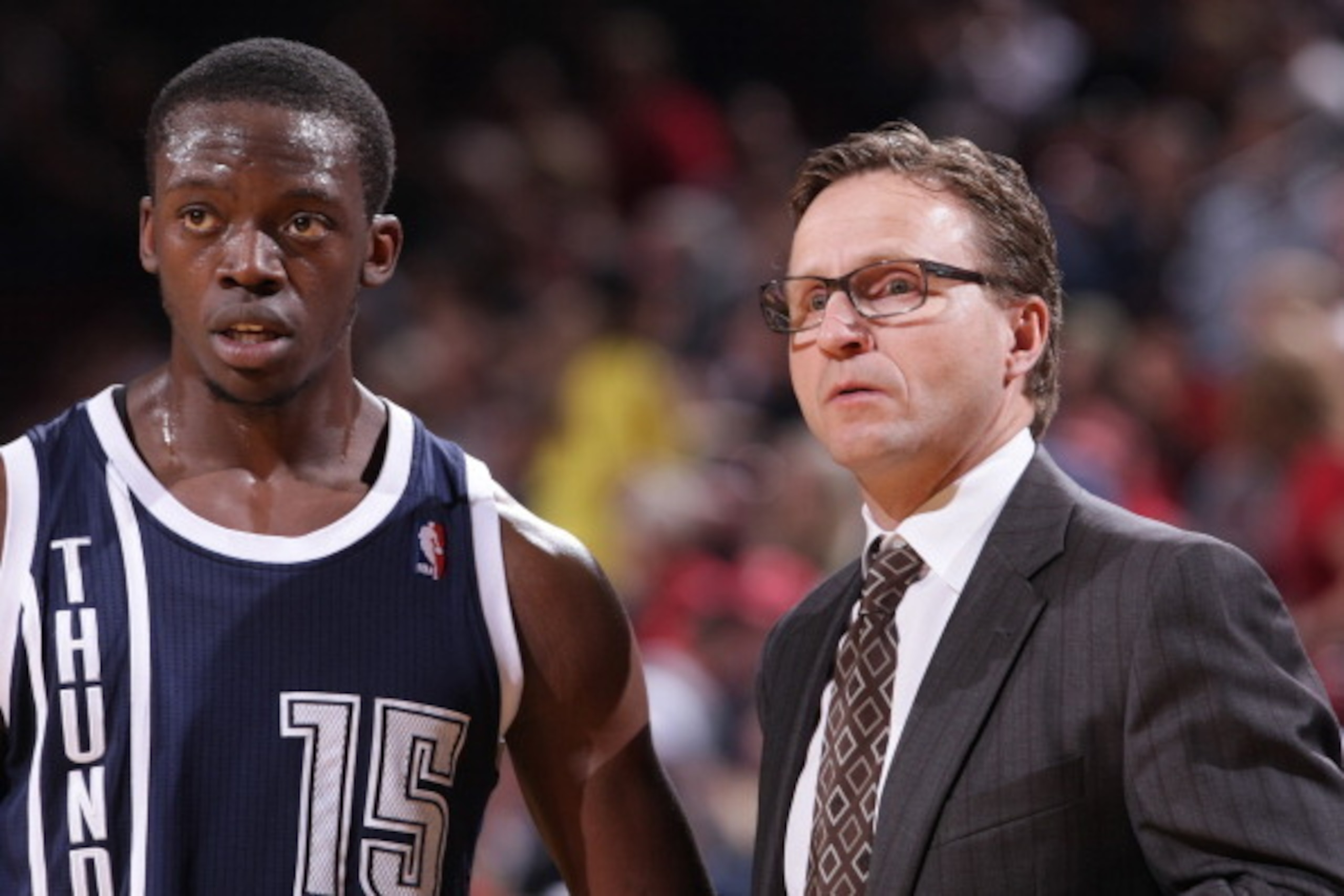 PORTLAND, OR - FEBRUARY 11:  Reggie Jackson #15 and Scott Brooks of the Oklahoma City Thunder talk against the Portland Trail Blazers on February 11, 2014 at the Moda Center Arena in Portland, Oregon. NOTE TO USER: User expressly acknowledges and agrees t