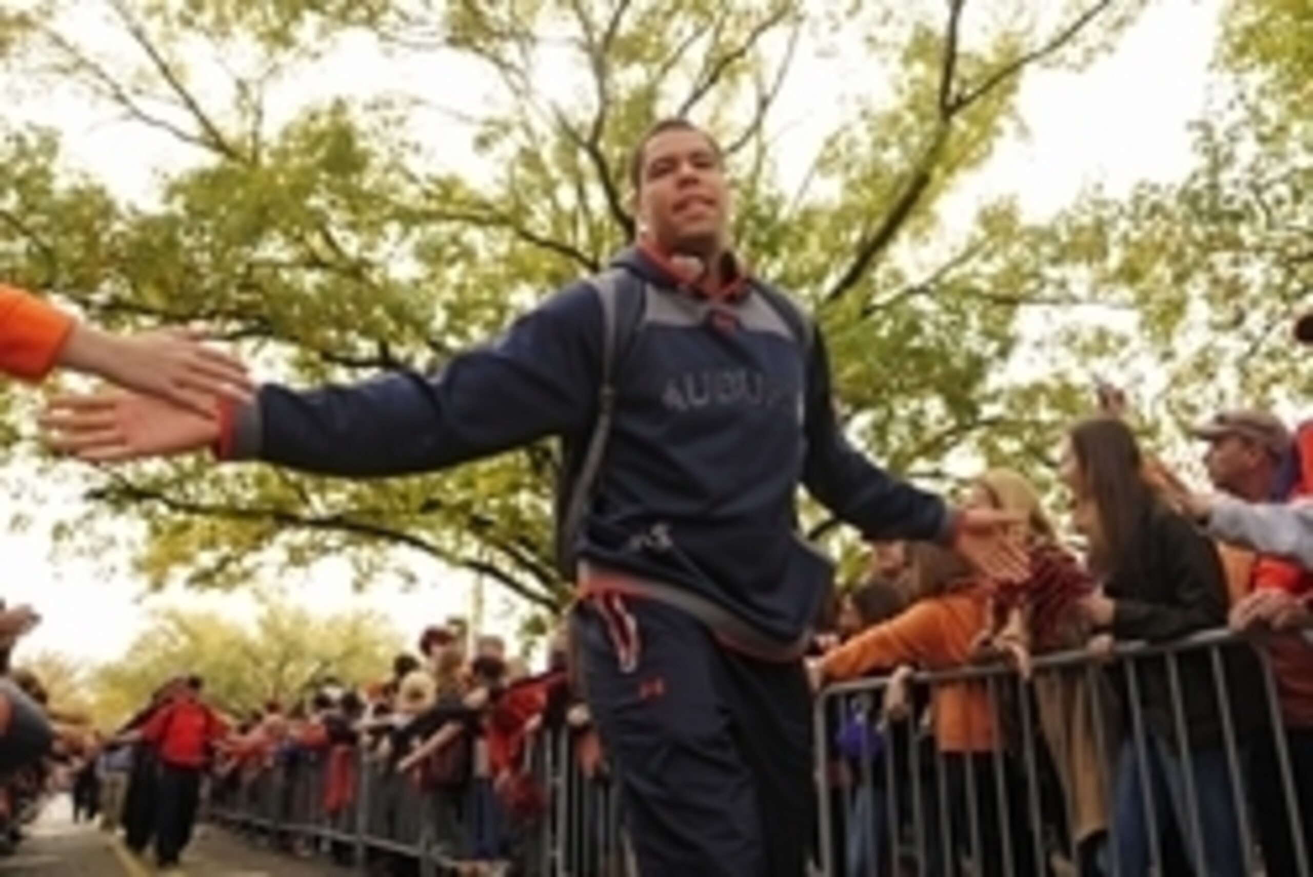 Nov 8, 2014; Auburn, AL, USA; Auburn Tigers tight end C.J. Uzomah greets fans at Tiger Walk prior to the game between the Auburn Tigers and the Texas A&M Aggies at Jordan Hare Stadium. Mandatory Credit: Shanna Lockwood-USA TODAY Sports