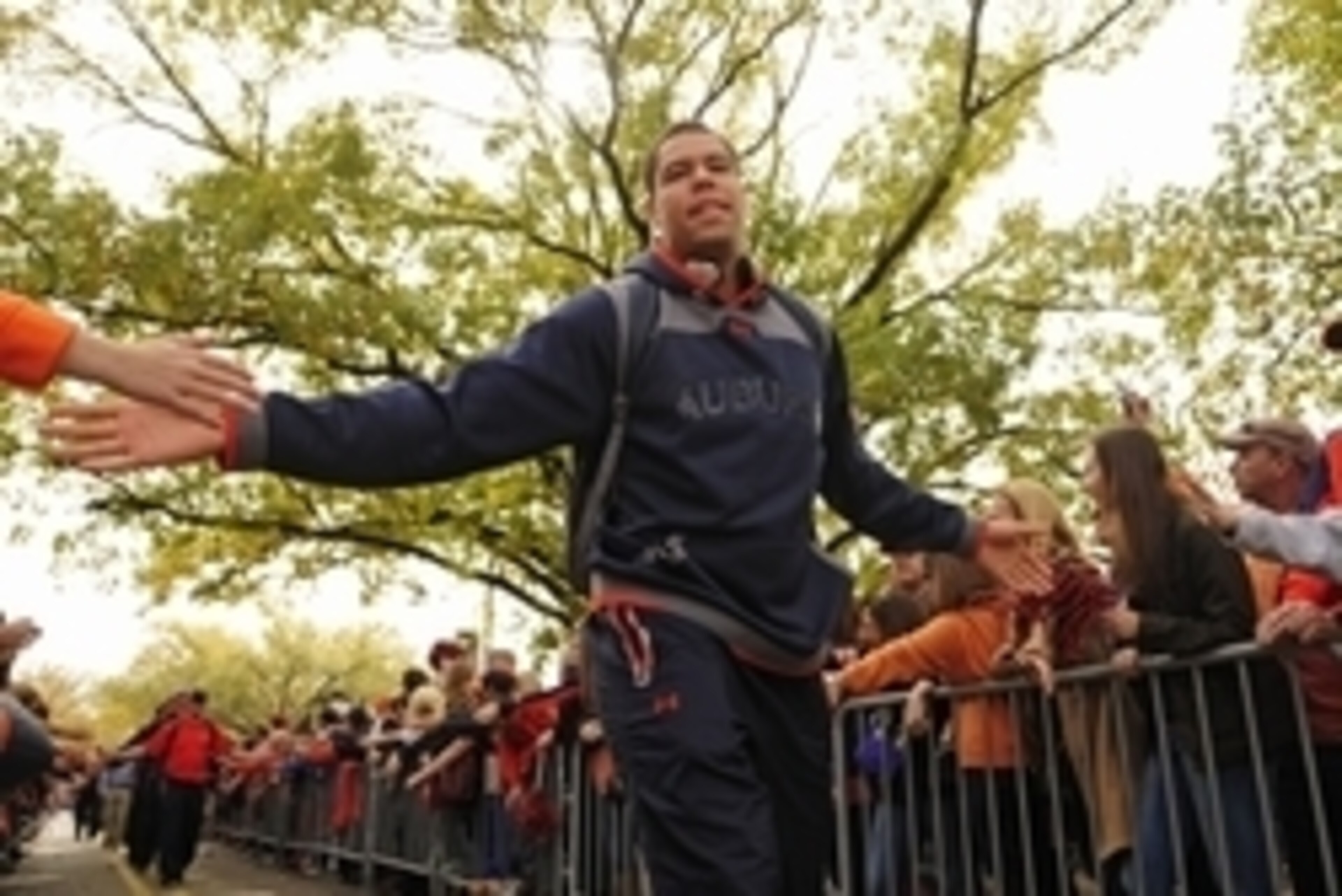 Nov 8, 2014; Auburn, AL, USA; Auburn Tigers tight end C.J. Uzomah greets fans at Tiger Walk prior to the game between the Auburn Tigers and the Texas A&M Aggies at Jordan Hare Stadium. Mandatory Credit: Shanna Lockwood-USA TODAY Sports