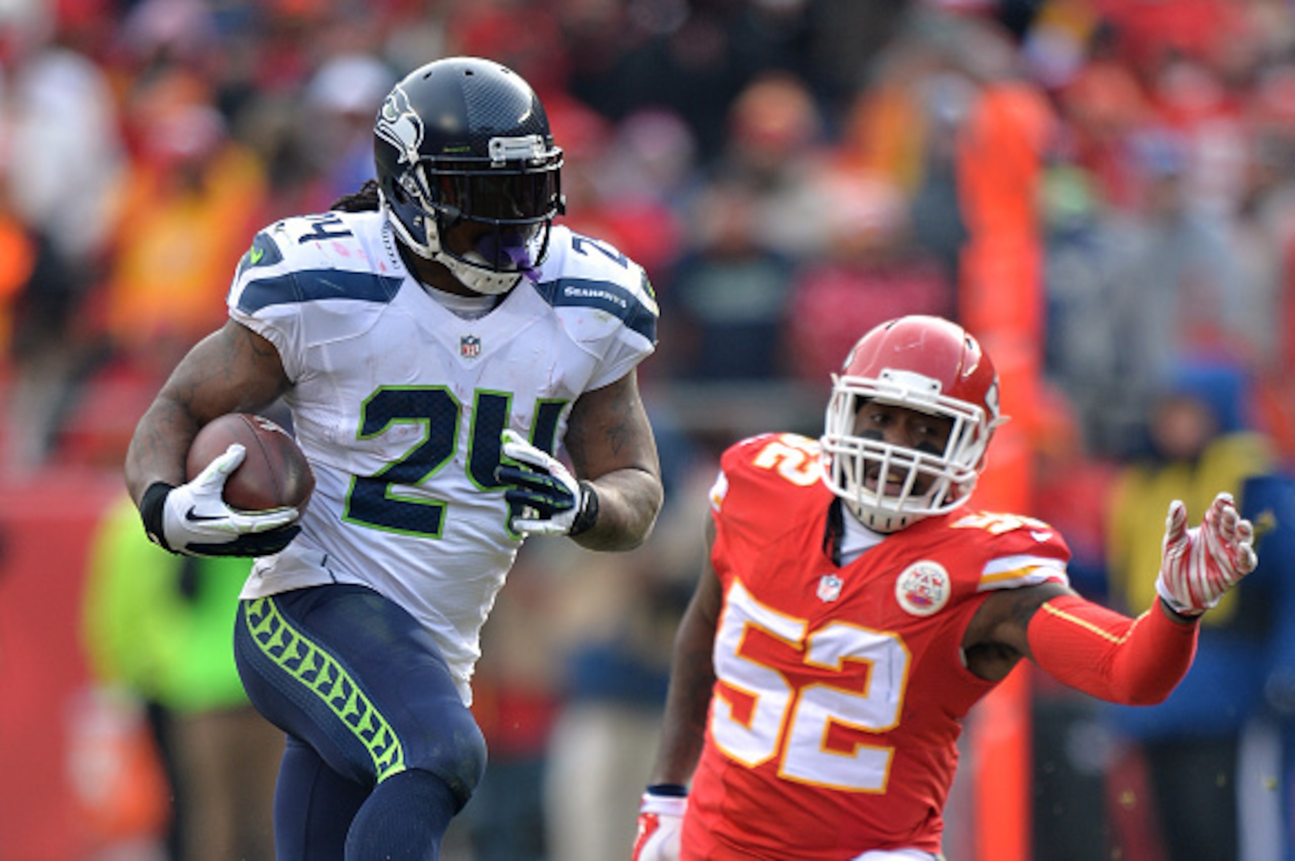 KANSAS CITY, MO - NOVEMBER 16: Marshawn Lynch #24 of the Seattle Seahawks runs the ball past James-Michael Johnson #52 of the Kansas City Chiefs during the first half at Arrowhead Stadium on November 16, 2014 in Kansas City, Missouri. (Photo by Peter A KANSAS CITY, MO - NOVEMBER 16: Marshawn Lynch #24 of the Seattle Seahawks runs the ball past James-Michael Johnson #52 of the Kansas City Chiefs during the first half at Arrowhead Stadium on November 16, 2014 in Kansas City, Missouri. (Photo by Peter A