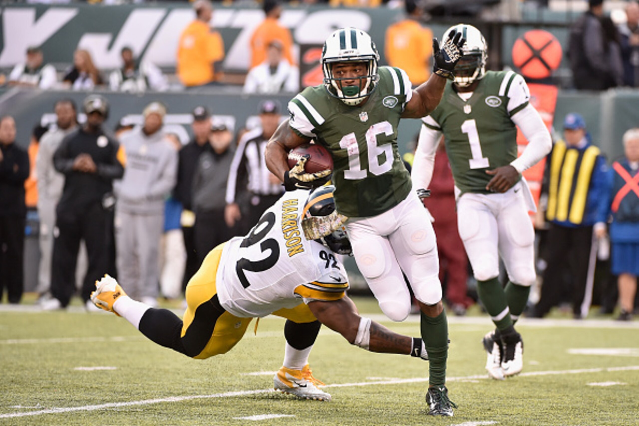 EAST RUTHERFORD, NJ - NOVEMBER 03:  Percy Harvin #16 of the New York Jets runs against  James Harrison #92 of the Pittsburgh Steelers during their game at MetLife Stadium on November 3, 2014 in East Rutherford, New Jersey.  (Photo by Al Bello/Getty Images