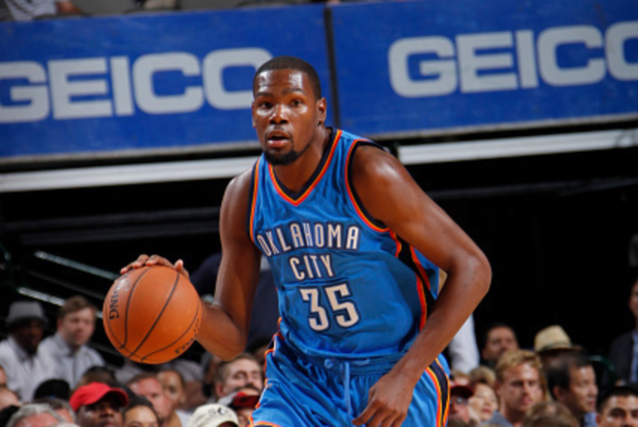 DALLAS, TX - OCTOBER 10: Kevin Durant #35 of the Oklahoma City Thunder handles the ball against the Dallas Mavericks on October 10, 2014 at the American Airlines Center in Dallas, Texas. NOTE TO USER: User expressly acknowledges and agrees that, by downlo