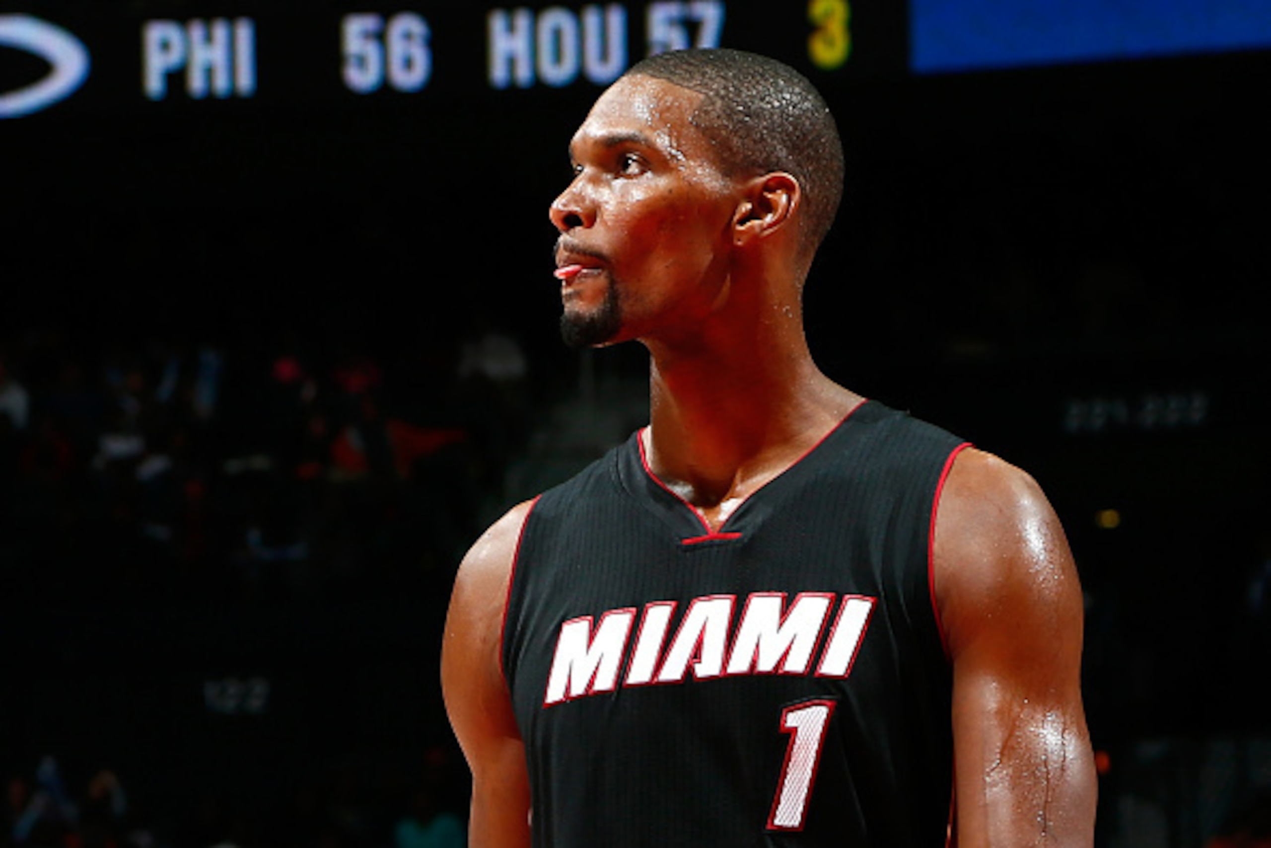 ATLANTA, GA - NOVEMBER 14:  Chris Bosh #1 of the Miami Heat reacts after a turnover to the Atlanta Hawks at Philips Arena on November 14, 2014 in Atlanta, Georgia.  NOTE TO USER: User expressly acknowledges and agrees that, by downloading and or using thi