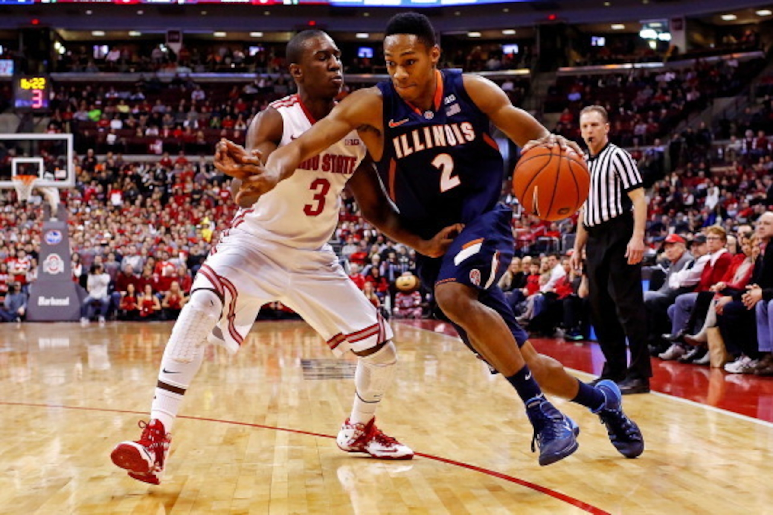 COLUMBUS, OH - JANUARY 23:  Joseph Bertrand #2 of the Illinois Fighting Illini drives past Shannon Scott #3 of the Ohio State Buckeyes during the first half at Value City Arena on January 23, 2014 in Columbus, Ohio. (Photo by Kirk Irwin/Getty Images)