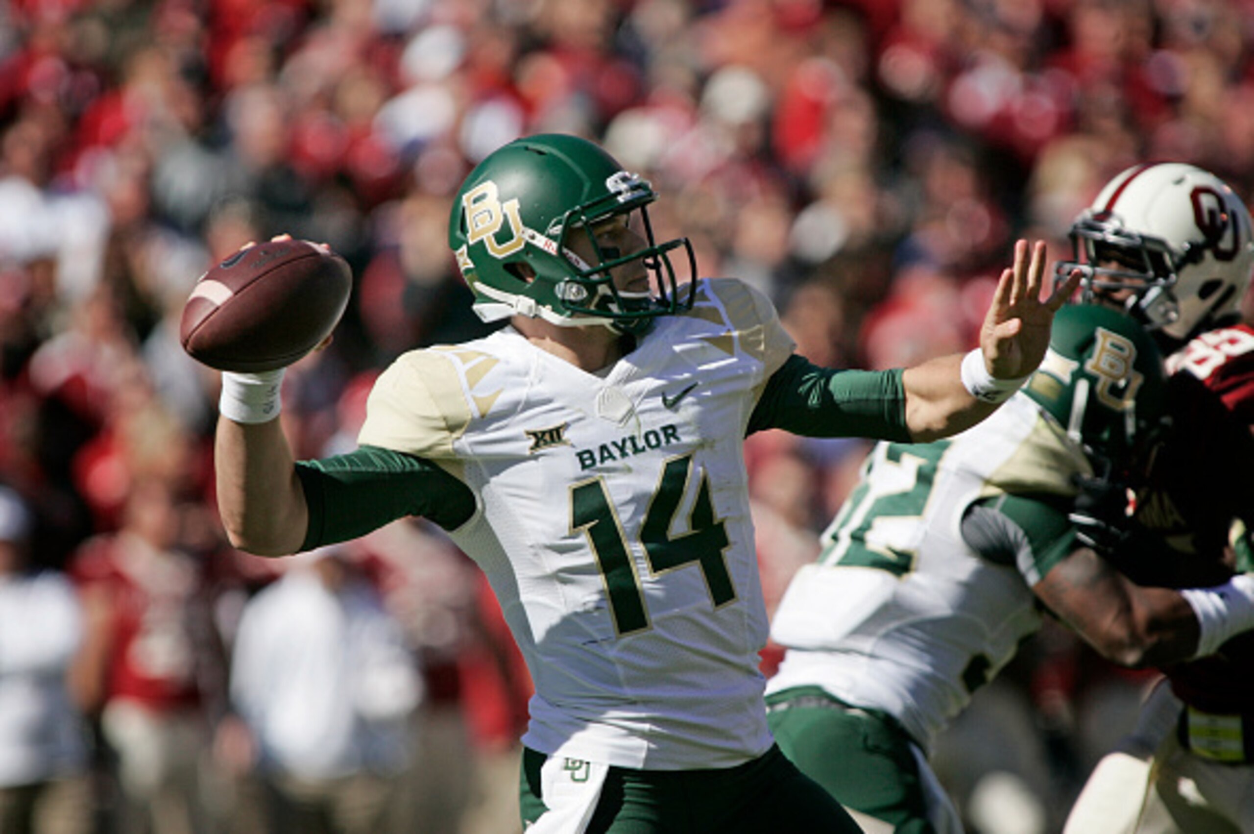 NORMAN, OK - NOVEMBER 8: Quarterback Bryce Petty #14 of the Baylor Bears looks to throw against the Oklahoma Sooners November 8, 2014 at Gaylord Family-Oklahoma Memorial Stadium in Norman, Oklahoma. Baylor defeated Oklahoma 48-14. (Photo by Brett Deerin NORMAN, OK - NOVEMBER 8: Quarterback Bryce Petty #14 of the Baylor Bears looks to throw against the Oklahoma Sooners November 8, 2014 at Gaylord Family-Oklahoma Memorial Stadium in Norman, Oklahoma. Baylor defeated Oklahoma 48-14. (Photo by Brett Deerin