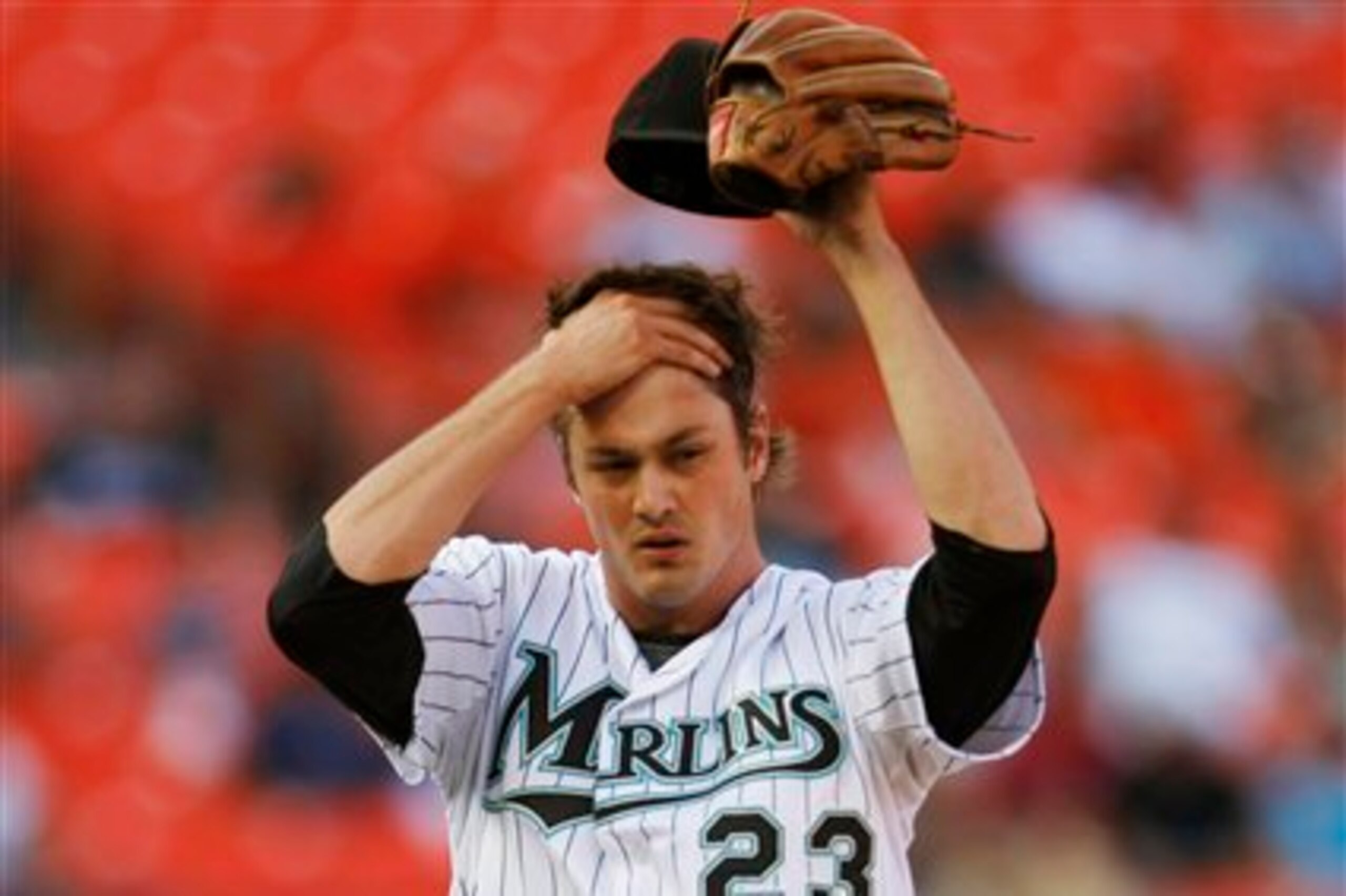 In three years with the Marlins, Andrew Miller's ERA was near 6.00.
