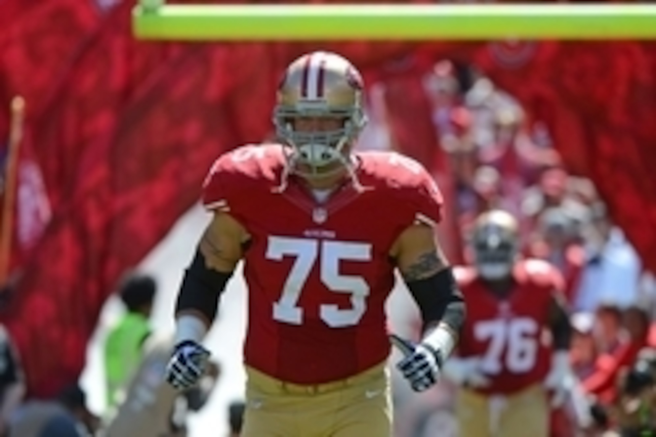 September 22, 2013; San Francisco, CA, USA; San Francisco 49ers guard Alex Boone (75) jogs onto the field during player introductions before the game against the Indianapolis Colts at Candlestick Park. The Colts defeated the 49ers 27-7. Mandatory Credit: 