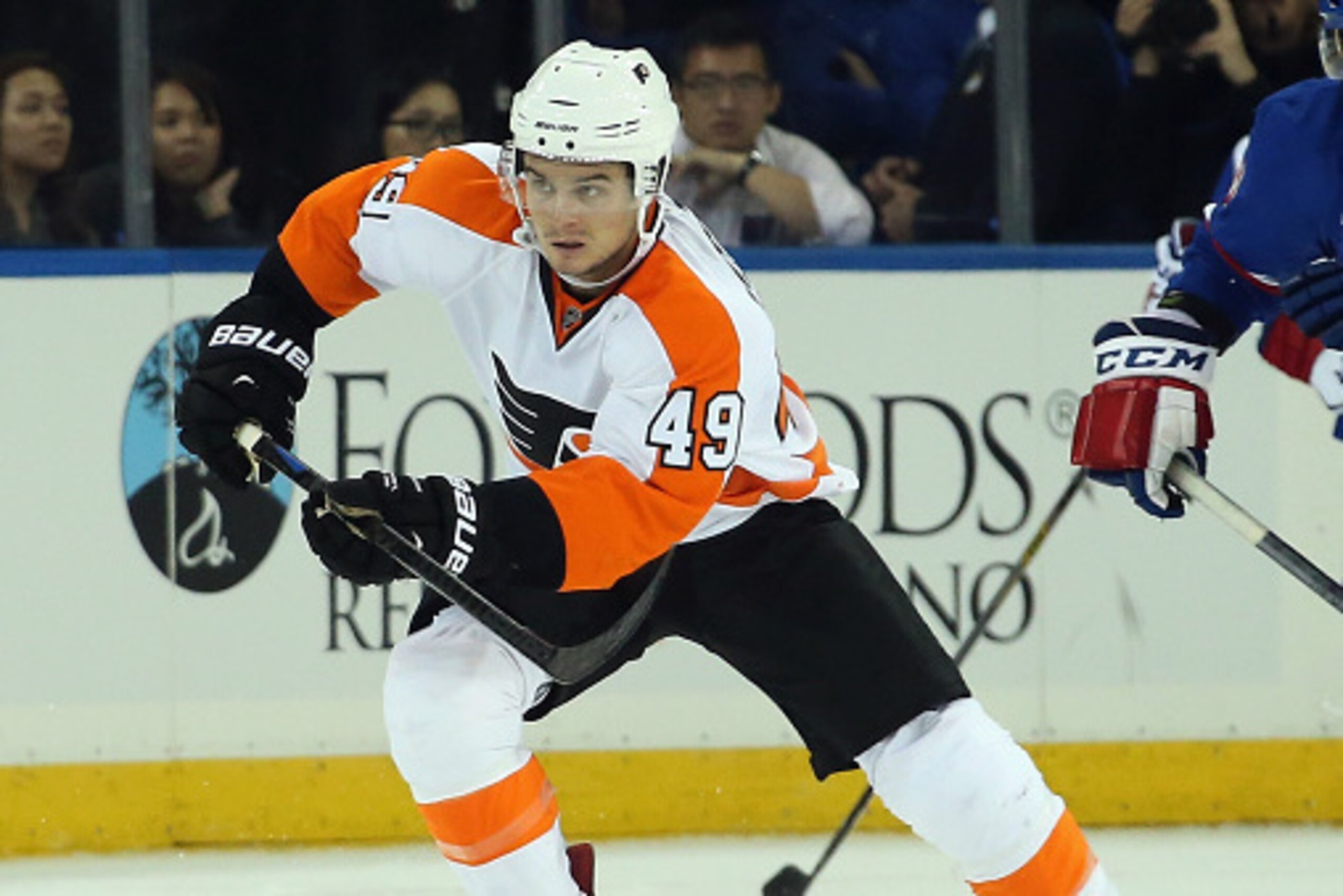 NEW YORK, NY - SEPTEMBER 29: Scott Laughton #49 of the Philadelphia Flyers skates against the New York Rangers at Madison Square Garden on September 29, 2014 in New York City. The Rangers defeated the Flyers 6-3.  (Photo by Bruce Bennett/Getty Images)