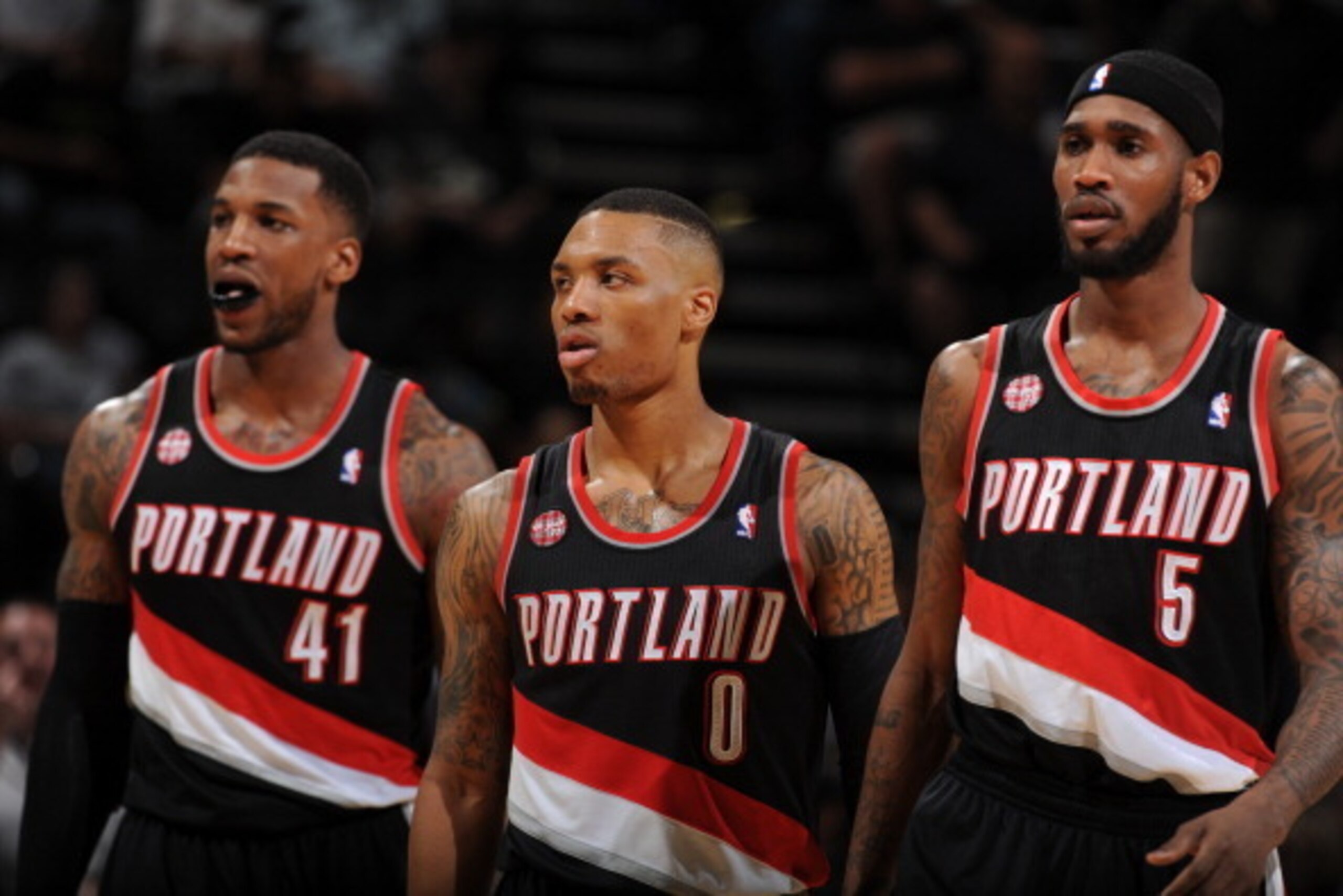 SAN ANTONIO, TX - MAY 6: Thomas Robinson #41, Damian Lillard #0, and Will Barton #5 of the Portland Trail Blazers look on in Game One of the Western Conference Semi-Finals against the San Antonio Spurs during the 2014 NBA Playoffs at AT&T Center on May 6,