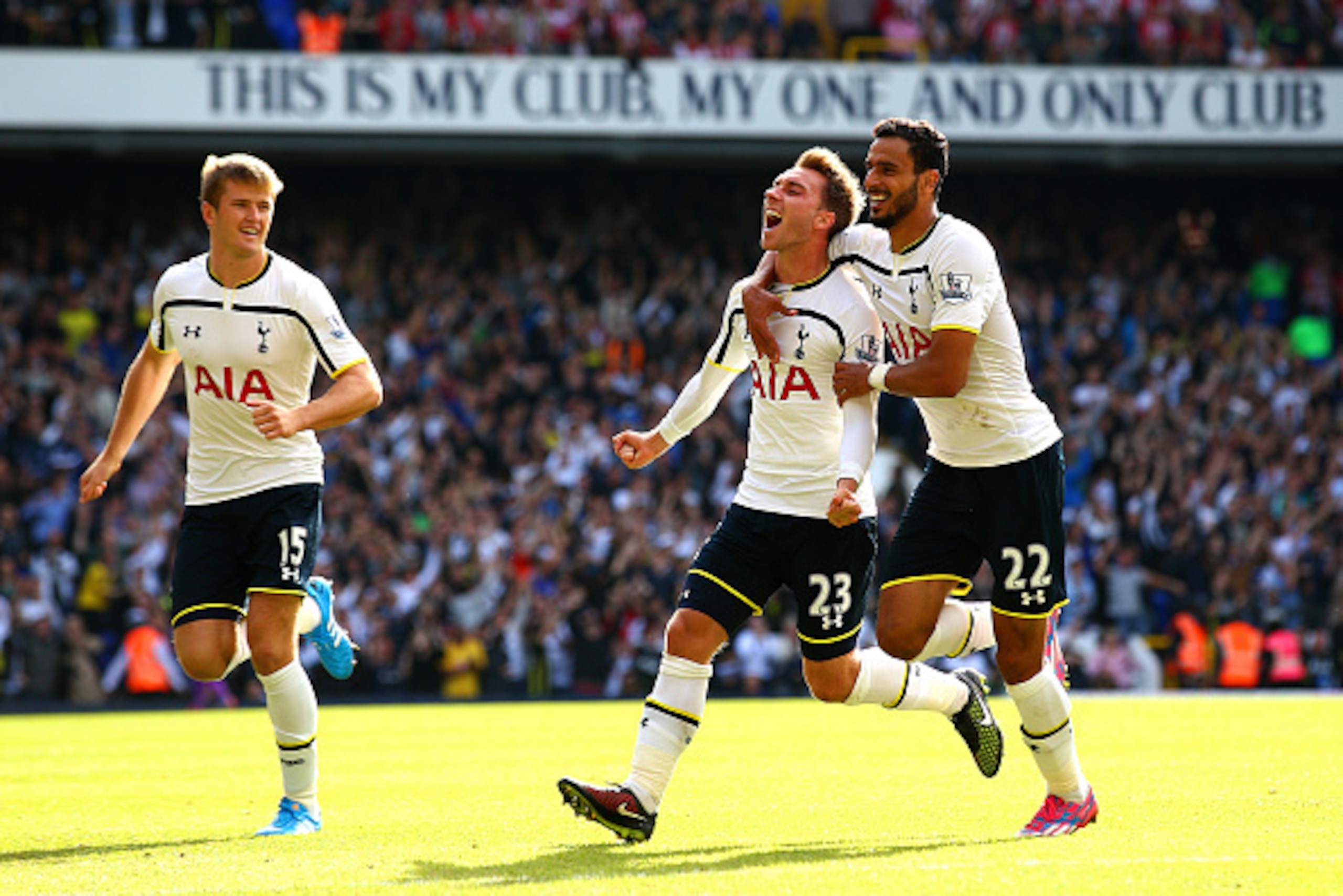 LONDON, ENGLAND - OCTOBER 05:  Christian Eriksen of Spurs celebrates with team-mates Nacer Chadli and Eric Dier after scoring the opening goal during the Barclays Premier League match between Tottenham Hotspur and Southampton at White Hart Lane on October