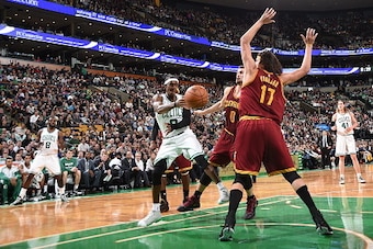 BOSTON, MA - NOVEMBER 14:  Rajon Rondo #9 of the Boston Celtics passes the ball against the Cleveland Cavaliers during the game on November 14, 2014 at the TD Garden in Boston, Massachusetts. NOTE TO USER: User expressly acknowledges and agrees that, by d