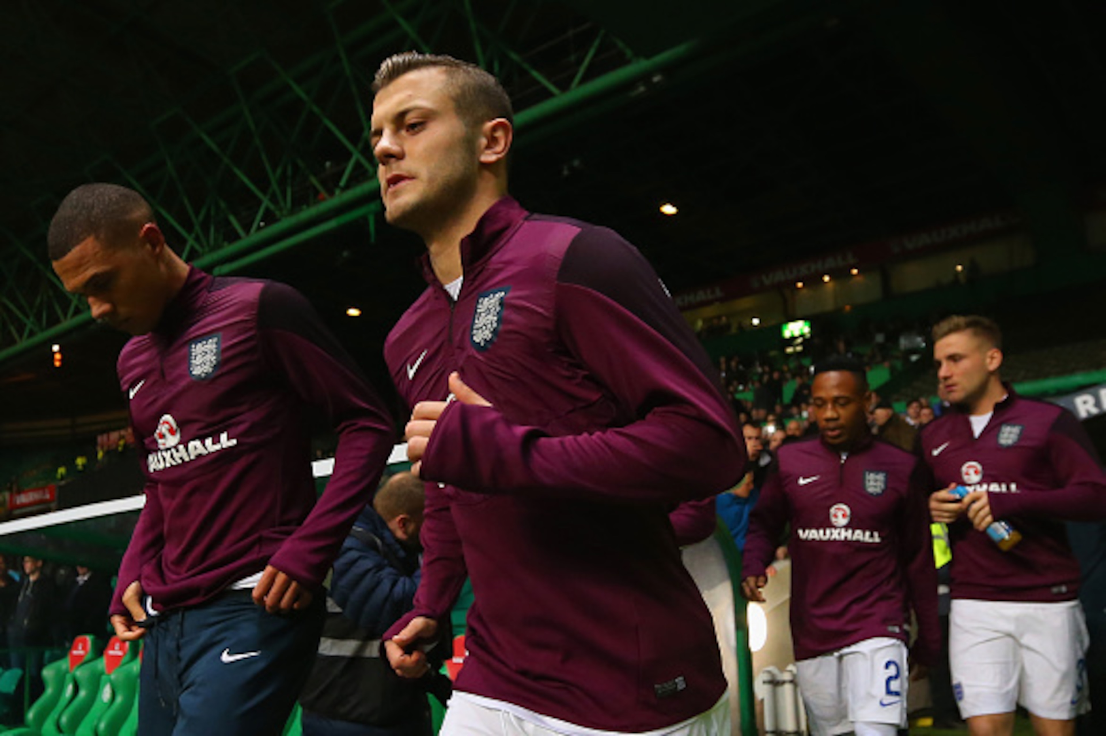 GLASGOW, SCOTLAND - NOVEMBER 18: Kieran Gibbs and Jack Wilshire of England head out to warm up ahead of the International Friendly between Scotland and England at Celtic Park Stadium on November 18, 2014 in Glasgow, Scotland.  (Photo by Alex Livesey/Getty