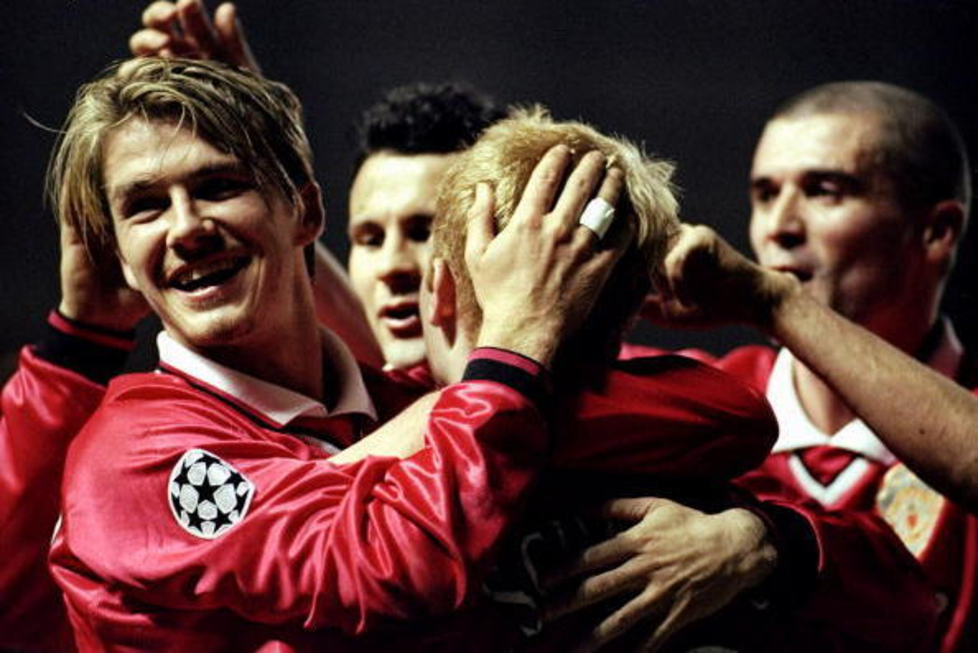 8 Dec 1999:  Congratulations for Manchester United scorer Paul Scholes during the Champions League game against Valencia at Old Trafford, manchester, England. Manchester United won 3 - 0. \ Mandatory Credit: Michael Steele /Allsport