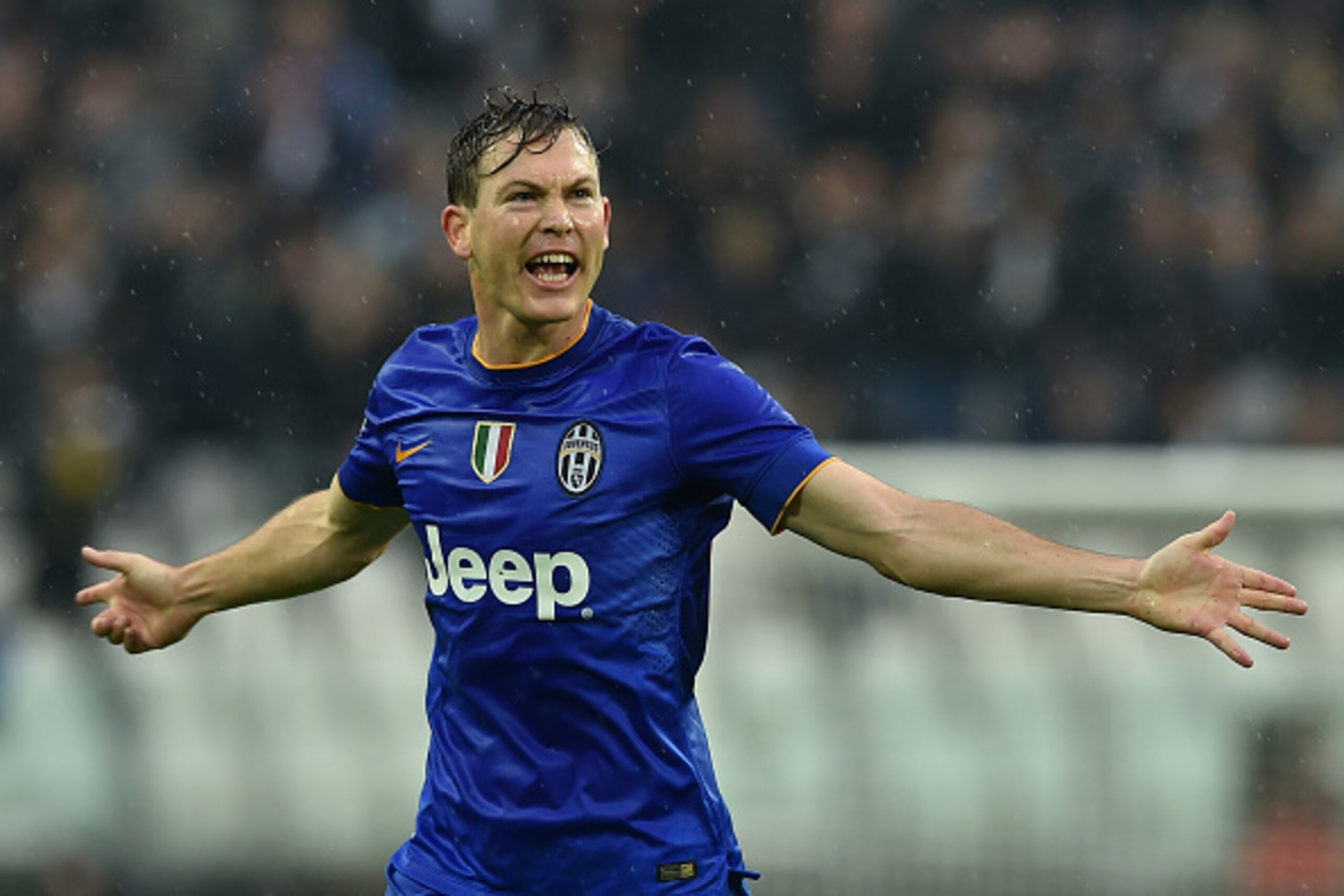 TURIN, ITALY - NOVEMBER 09:  Stephan Lichtsteiner of Juventus FC celebrates after scoring a goal during the Serie A match between Juventus FC and Parma FC at Juventus Arena on November 9, 2014 in Turin, Italy.  (Photo by Valerio Pennicino/Getty Images)