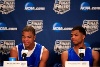ARLINGTON, TX - APRIL 06:  Aaron Harrison of Kentucky talks with the media as Andrew Harrison looks on during an NCAA Men's Final Four press conference at AT&T Stadium on April 6, 2014 in Arlington, Texas.  (Photo by Jamie Squire/Getty Images)