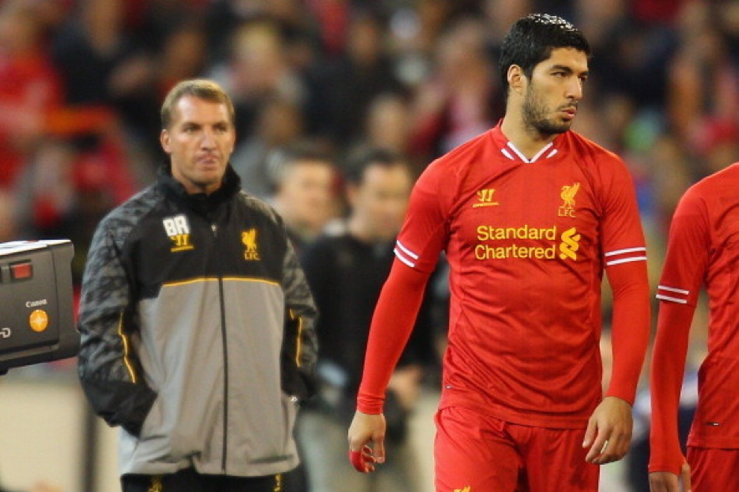 MELBOURNE, AUSTRALIA - JULY 24:  Liverpool FC Manager Brendan Rodgers (L) looks on as Luis Suarez of Liverpool is substituted into the match during the match between the Melbourne Victory and Liverpool at the Melbourne Cricket Ground on July 24, 2013 in M