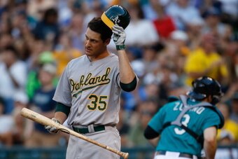 SEATTLE, WA - JULY 11:  Nate Freiman #35 of the Oakland Athletics heads back to the dugout after striking out to end the top of the fourth inning against the Seattle Mariners at Safeco Field on July 11, 2014 in Seattle, Washington.  (Photo by Otto Greule 