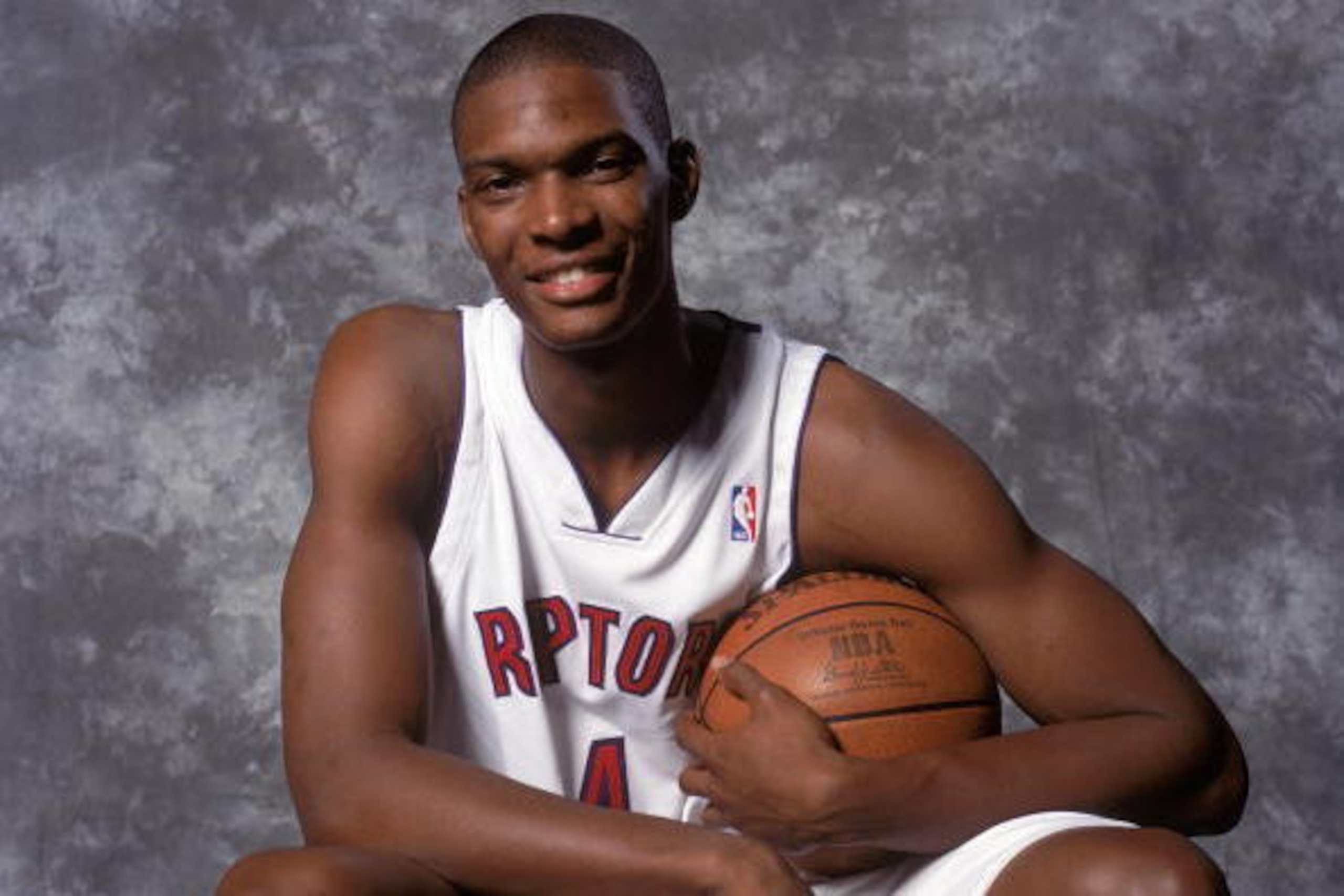 TORONTO - OCTOBER 4: Chris Bosh #4 of the Toronto Raptors poses for a portrait during NBA Media Day on October 4, 2004 in Toronto, Ontario, Canada. NOTE TO USER: User expressly acknowledges and agrees that, by downloading and/or using this Photograph, u TORONTO - OCTOBER 4: Chris Bosh #4 of the Toronto Raptors poses for a portrait during NBA Media Day on October 4, 2004 in Toronto, Ontario, Canada. NOTE TO USER: User expressly acknowledges and agrees that, by downloading and/or using this Photograph, u