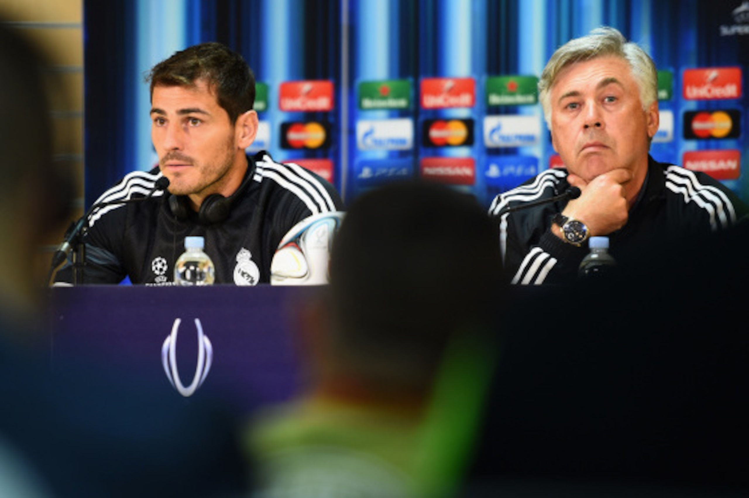 CARDIFF, WALES - AUGUST 11:  In this handout image provided by UEFA, Iker Casillas of Real Madrid and Real Manager Carlo Ancelotti during the Real Madrid press conference at Cardiff City Stadium on August 11, 2014 in Cardiff, Wales. (Photo by Handout/UEFA