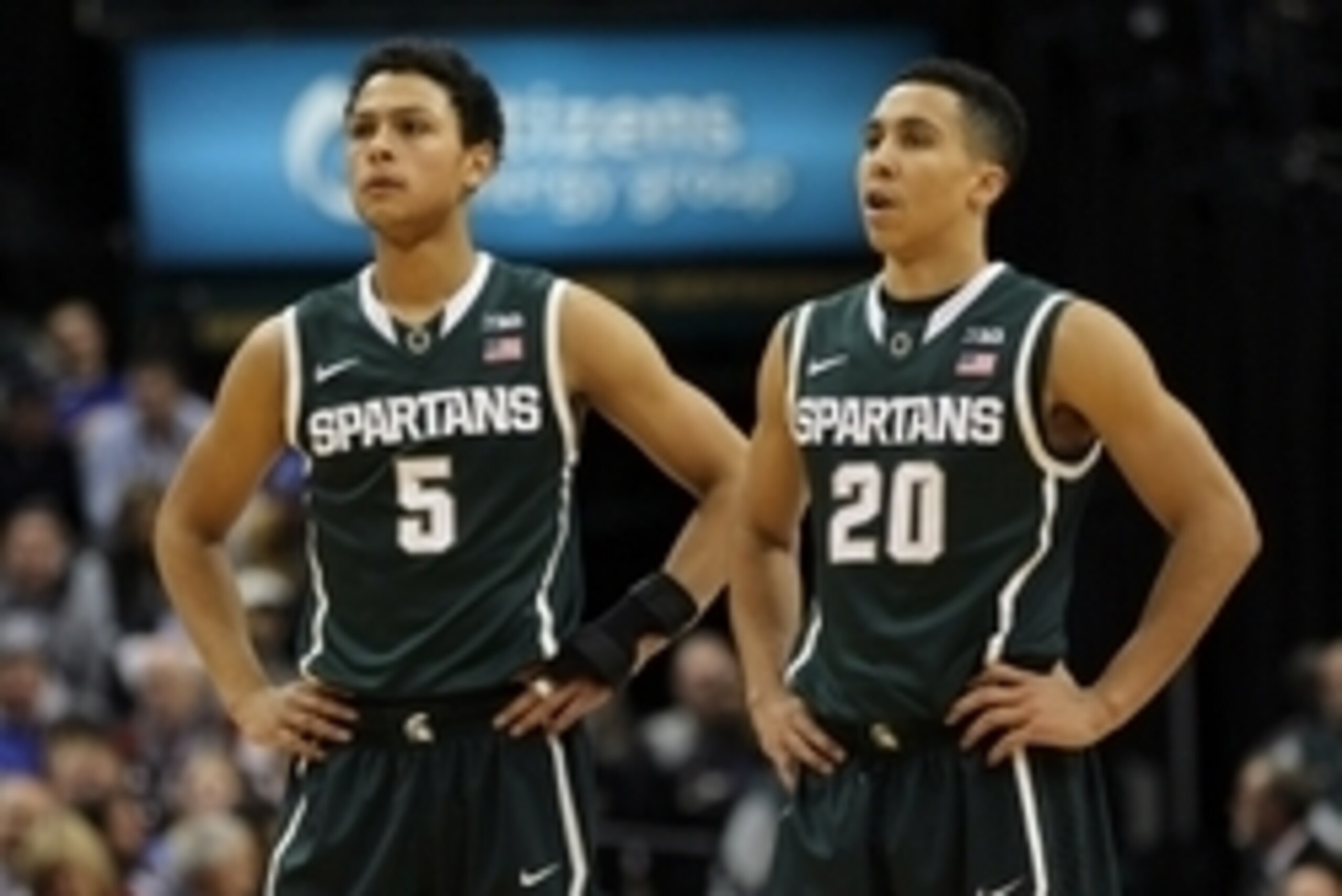Nov 18, 2014; Indianapolis, IN, USA; Michigan State Spartans guard Bryn Forbes (5) and guard Travis Trice (20) during the second half  against the Duke Blue Devils at Bankers Life Fieldhouse. Duke defeated Michigan State 71-61. Mandatory Credit: Pat Lovel