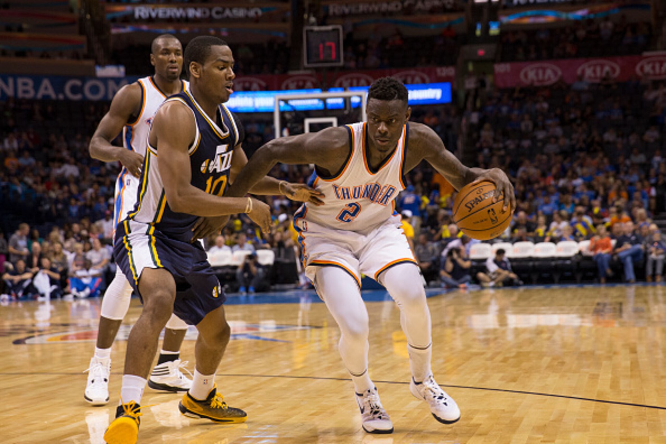 Oklahoma City, OK - OCTOBER 21: Anthony Morrow #2 of the Oklahoma City Thunder handles the ball against Alec Burks #10 of the Utah Jazz during the NBA preseason game on October 21, 2014 at the Chesapeake arena in Oklahoma City, Oklahoma. NOTE TO USER:  Us