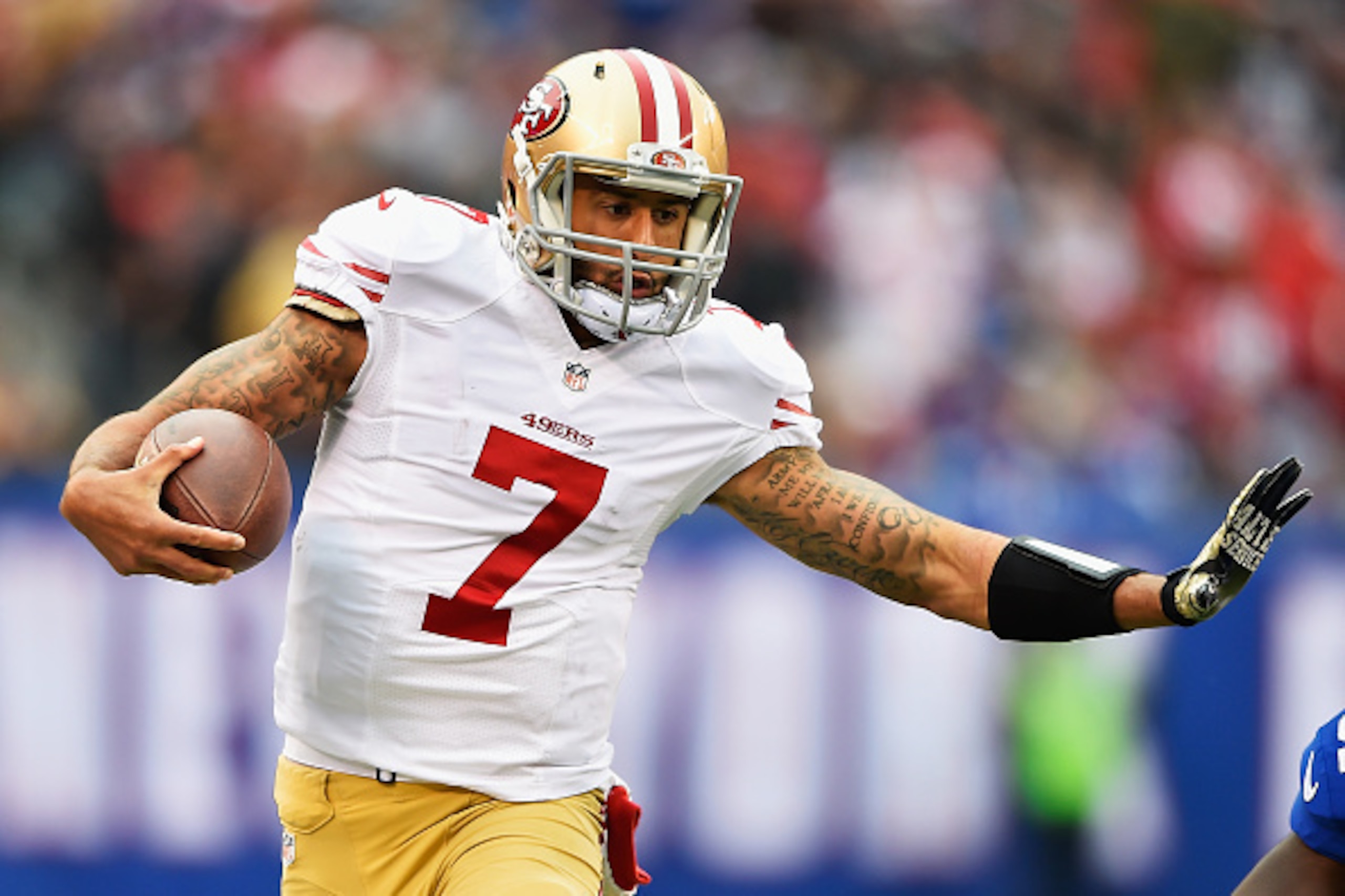 EAST RUTHERFORD, NJ - NOVEMBER 16:  Colin Kaepernick #7 of the San Francisco 49ers in action against the New York Giants during their game at MetLife Stadium on November 16, 2014 in East Rutherford, New Jersey.  (Photo by Al Bello/Getty Images)