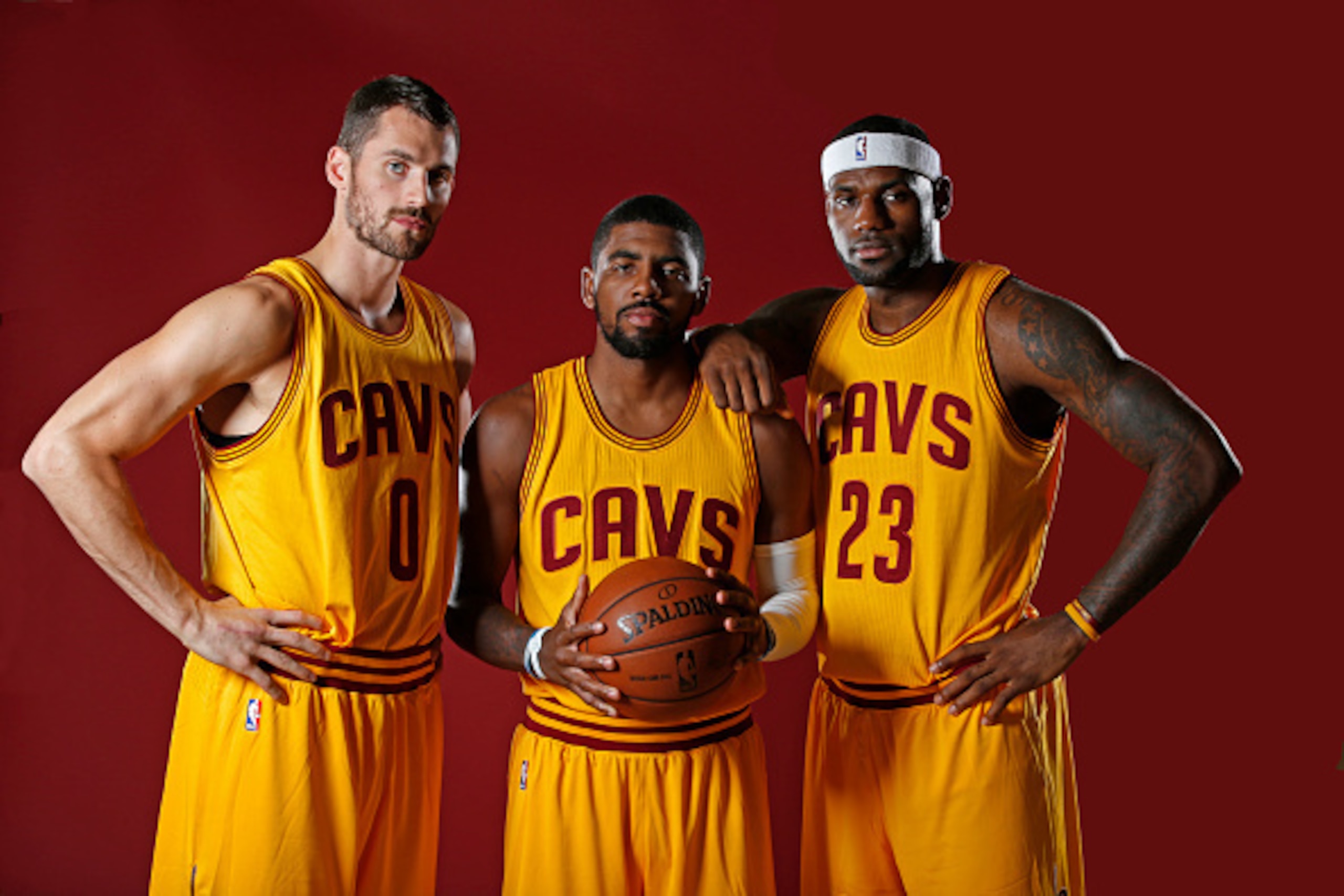 INDEPENDENCE, OH - SEPTEMBER 26: Kevin Love #0, Kyrie Irving #2 and LeBron James #23 of the Cleveland Cavaliers poses for a photo during media day on September 26, 2014 at the Cleveland Clinic Courts in Independence, Ohio. NOTE TO USER: User expressly a INDEPENDENCE, OH - SEPTEMBER 26: Kevin Love #0, Kyrie Irving #2 and LeBron James #23 of the Cleveland Cavaliers poses for a photo during media day on September 26, 2014 at the Cleveland Clinic Courts in Independence, Ohio. NOTE TO USER: User expressly a