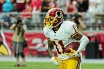 Oct 12, 2014; Glendale, AZ, USA; Washington Redskins wide receiver DeSean Jackson (11) celebrates after scoring a 64 yard touchdown during the first half against the Arizona Cardinals at University of Phoenix Stadium. Mandatory Credit: Matt Kartozian-USA 