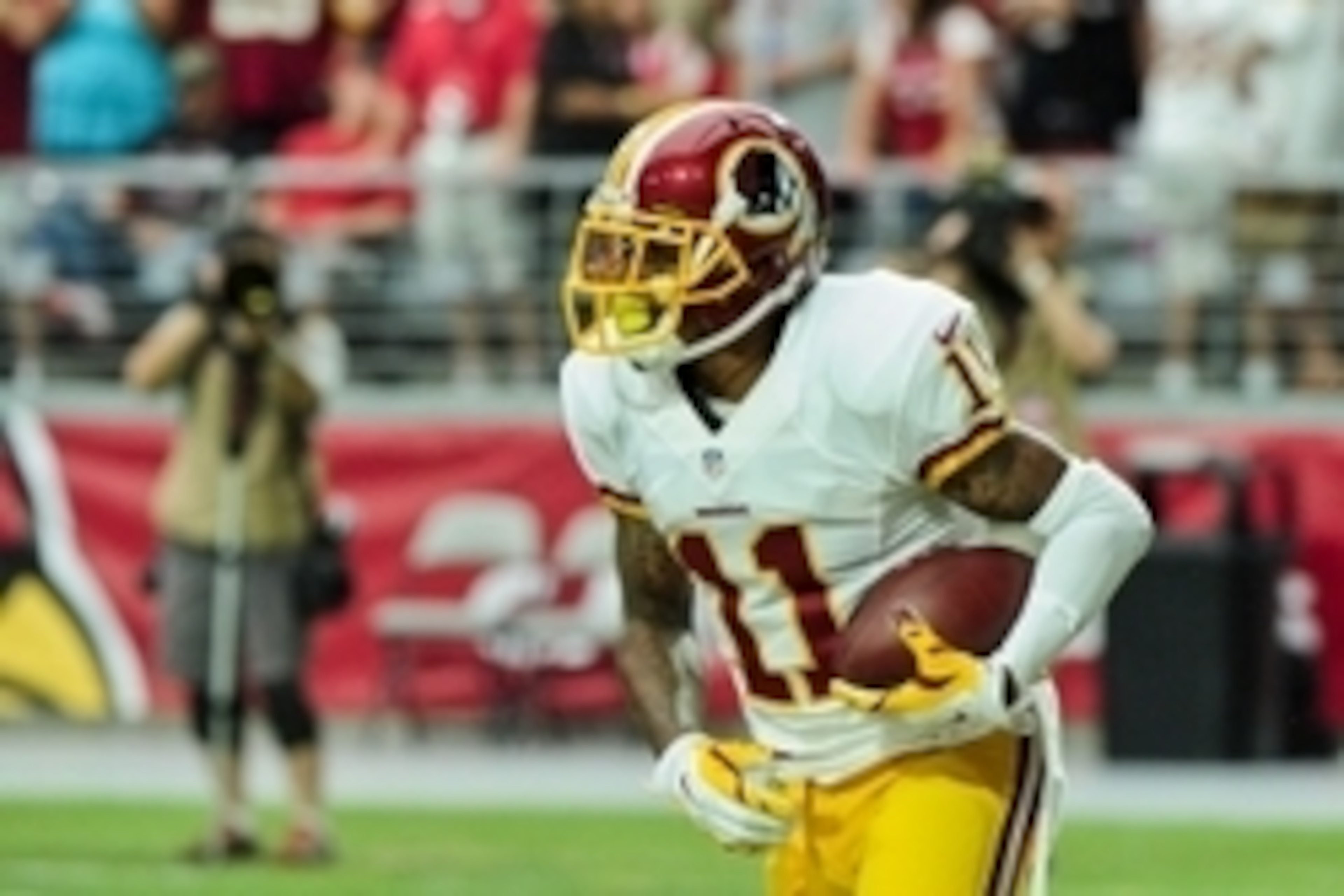 Oct 12, 2014; Glendale, AZ, USA; Washington Redskins wide receiver DeSean Jackson (11) celebrates after scoring a 64 yard touchdown during the first half against the Arizona Cardinals at University of Phoenix Stadium. Mandatory Credit: Matt Kartozian-USA 