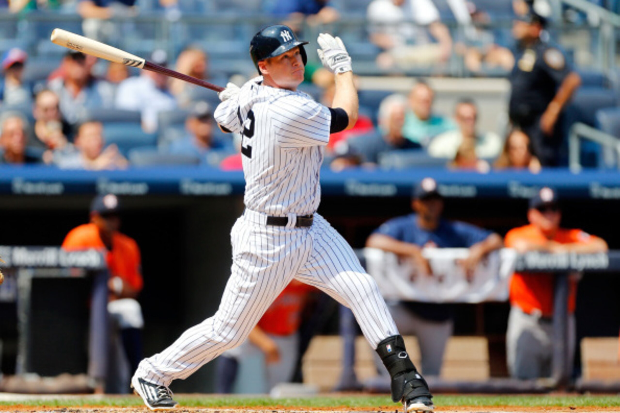 NEW YORK, NY - AUGUST 21: Chase Headley #12 of the New York Yankees follows through on a second inning two run double against the Houston Astros at Yankee Stadium on August 21, 2014 in the Bronx borough of New York City. (Photo by Jim McIsaac/Getty Images