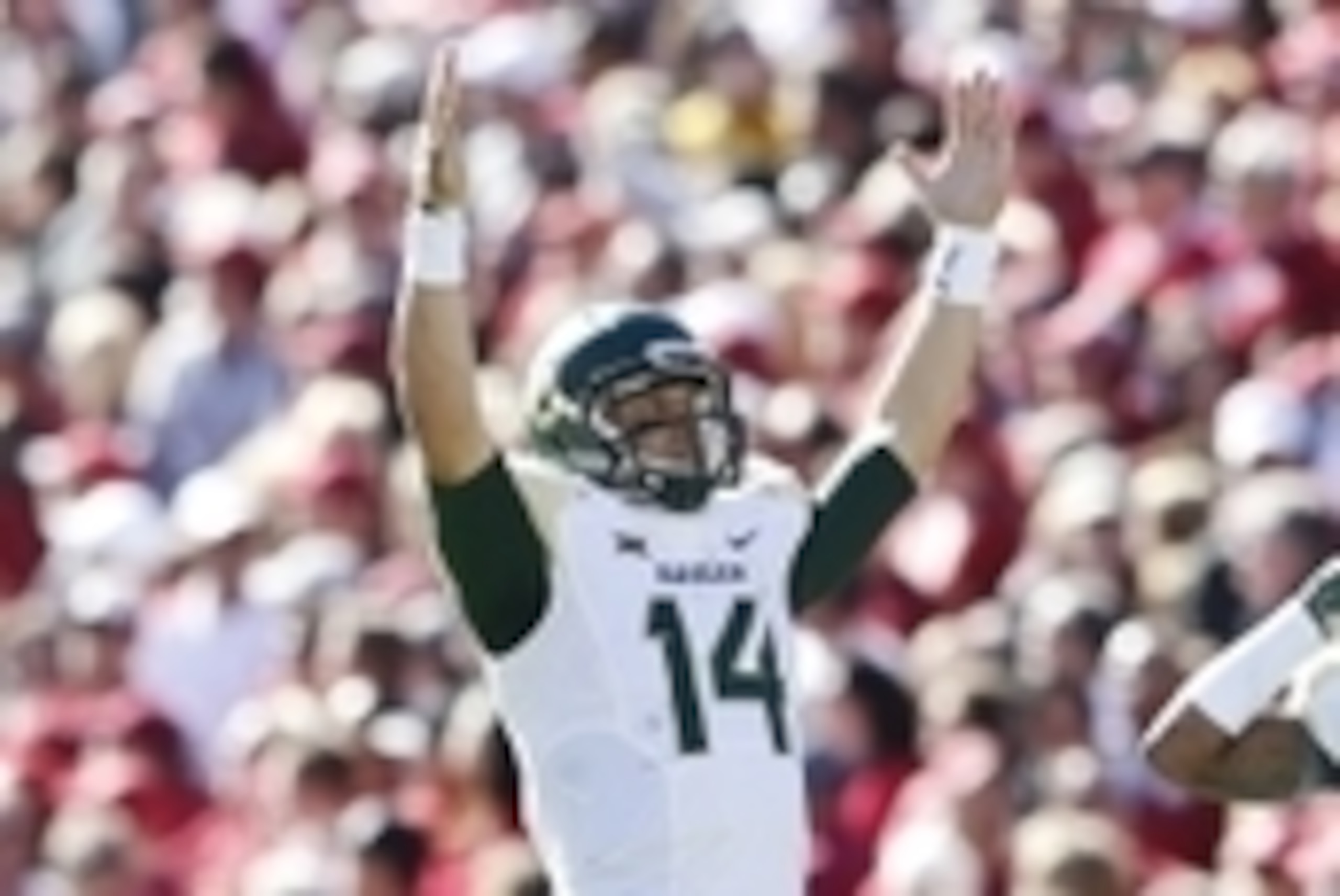Nov 8, 2014; Norman, OK, USA; Baylor Bears quarterback Bryce Petty (14) celebrates a touchdown pass during the game against the Oklahoma Sooners at Gaylord Family - Oklahoma Memorial Stadium. Mandatory Credit: Kevin Jairaj-USA TODAY Sports Nov 8, 2014; Norman, OK, USA; Baylor Bears quarterback Bryce Petty (14) celebrates a touchdown pass during the game against the Oklahoma Sooners at Gaylord Family - Oklahoma Memorial Stadium. Mandatory Credit: Kevin Jairaj-USA TODAY Sports