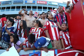 LOS ANGELES, CA - OCTOBER 26: Members of a Chivas USA fan section cheer after the game with the San Jose Earthquakes at StubHub Center on October 26, 2014 in Los Angeles, California.  (Photo by Stephen Dunn/Getty Images)