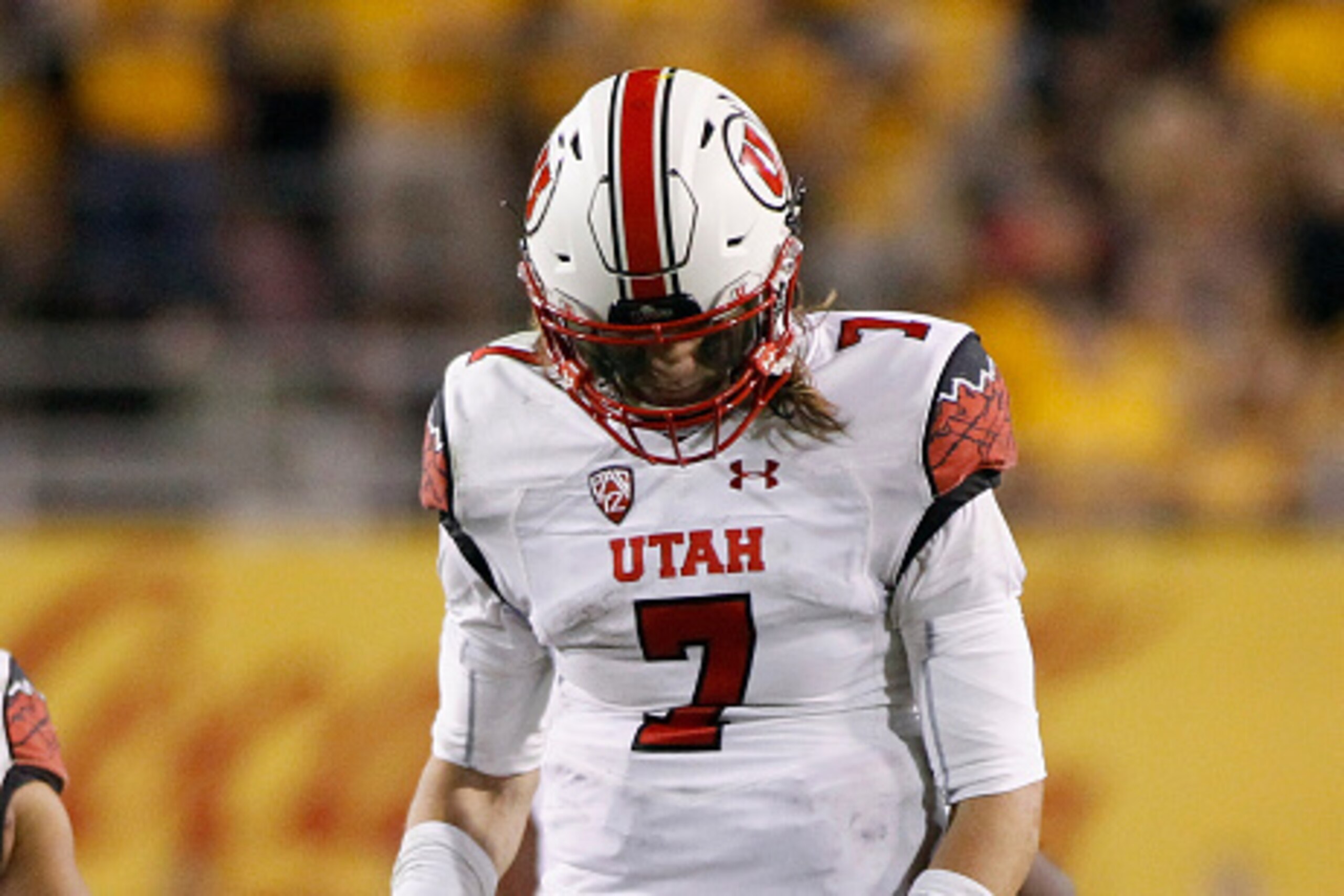 TEMPE, AZ - NOVEMBER 01: Quarterback Travis Wilson #7 of the Utah Utes reacts after a delay of game penalty during the fourth quarter of a college football game against the Arizona State Sun Devils at Sun Devil Stadium on November 1, 2014 in Tempe, Arizo TEMPE, AZ - NOVEMBER 01: Quarterback Travis Wilson #7 of the Utah Utes reacts after a delay of game penalty during the fourth quarter of a college football game against the Arizona State Sun Devils at Sun Devil Stadium on November 1, 2014 in Tempe, Arizo