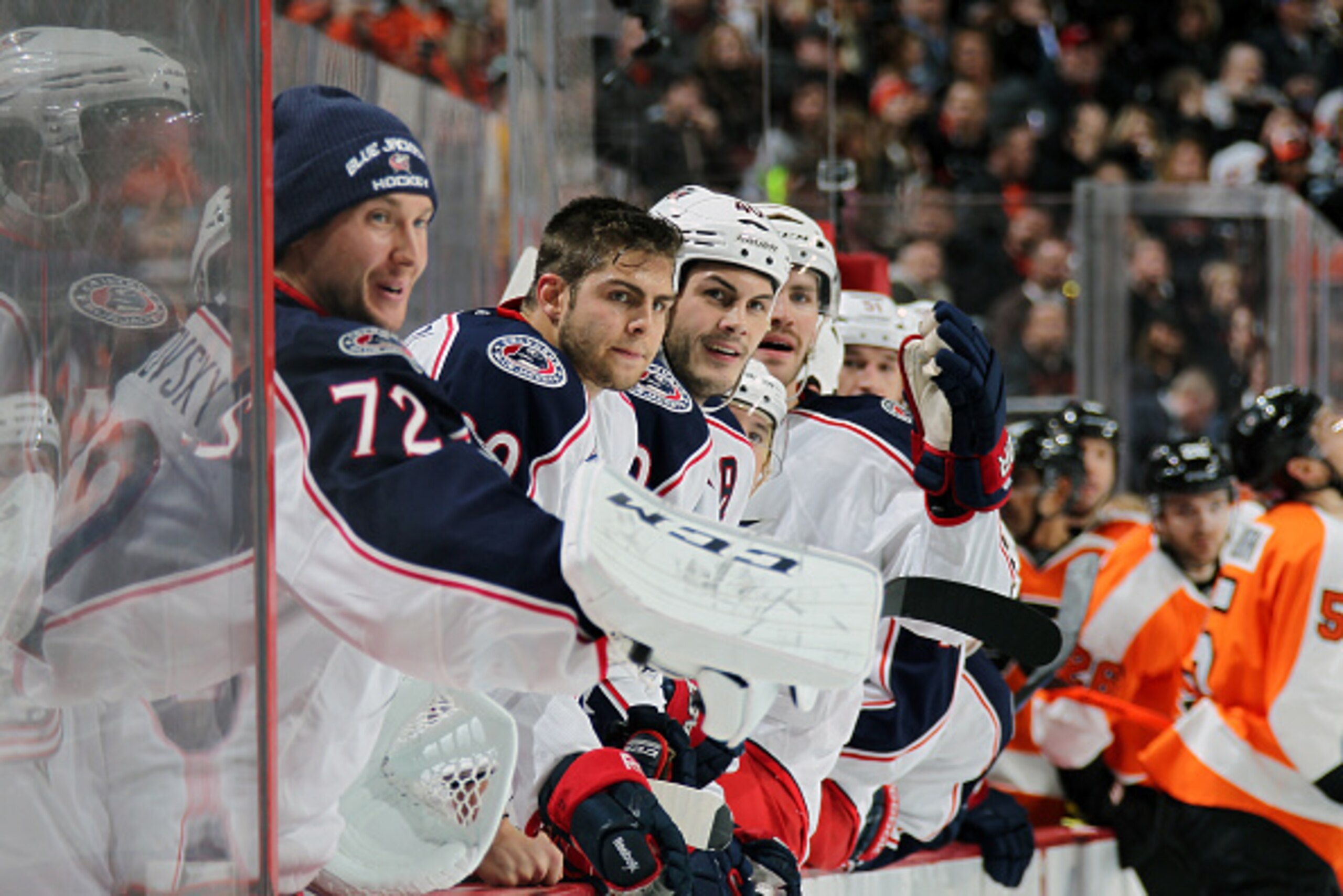 PHILADELPHIA, PA - NOVEMBER 14:  Sergei Bobrovsky #72, Tim Erixon #20 and Jared Boll #40 of the Columbus Blue Jackets celebrate a second period goal on their bench against the Philadelphia Flyers on November 14, 2014 at the Wells Fargo Center in Philadelp