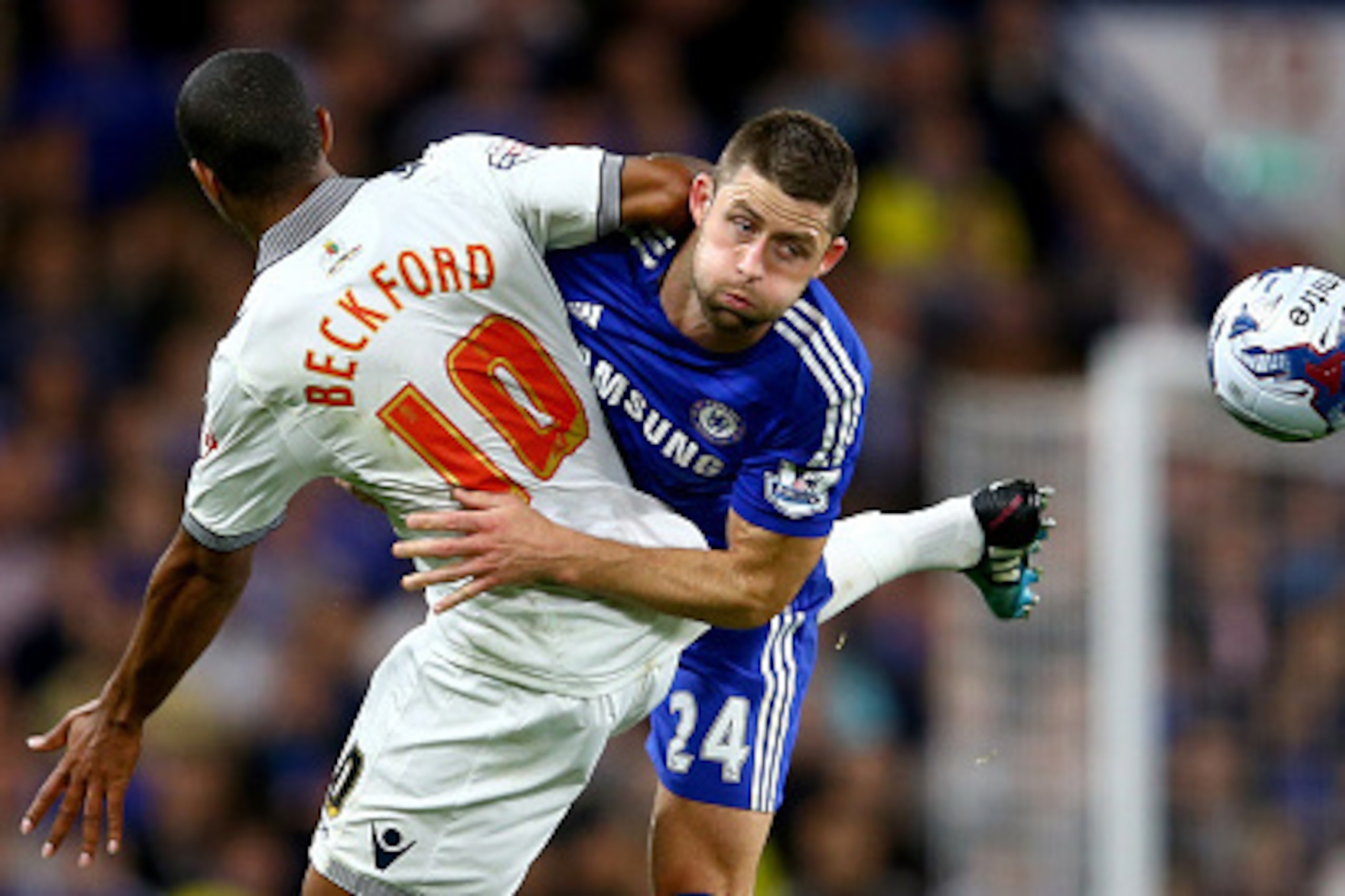LONDON, ENGLAND - SEPTEMBER 24:  Jermaine Beckford of Bolton battles with Gary Cahill of Chelsea during the Captial One Cup Third Round match between Chelsea and Bolton Wanderers at Stamford Bridge on September 24, 2014 in London, England.  (Photo by Rich