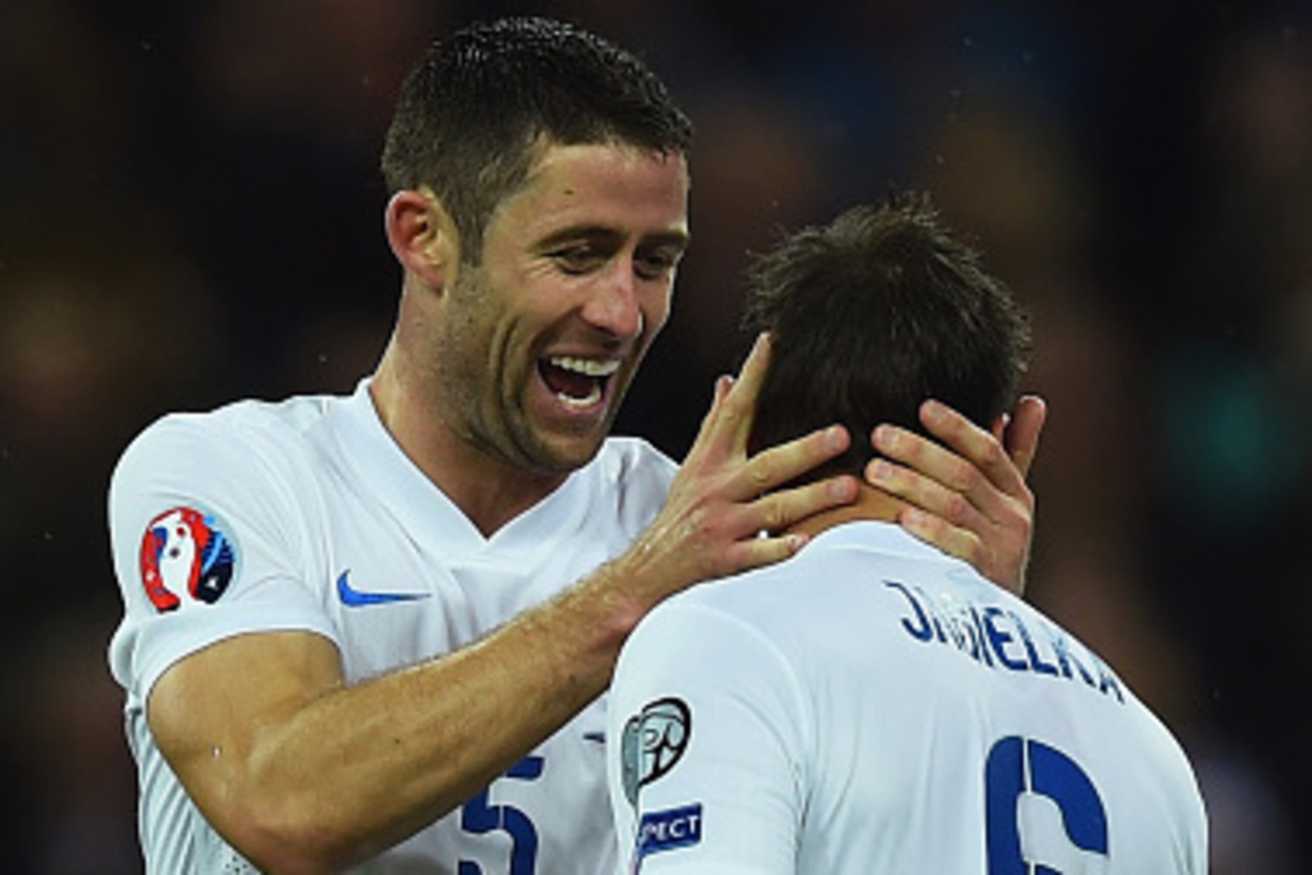 LONDON, ENGLAND - OCTOBER 09:  Phil Jagielka of England (6) celebrates with team mate Gary Cahill (5) as he scores their first goal during the EURO 2016 Group E Qualifying match between England and San Marino at Wembley Stadium on October 9, 2014 in Londo