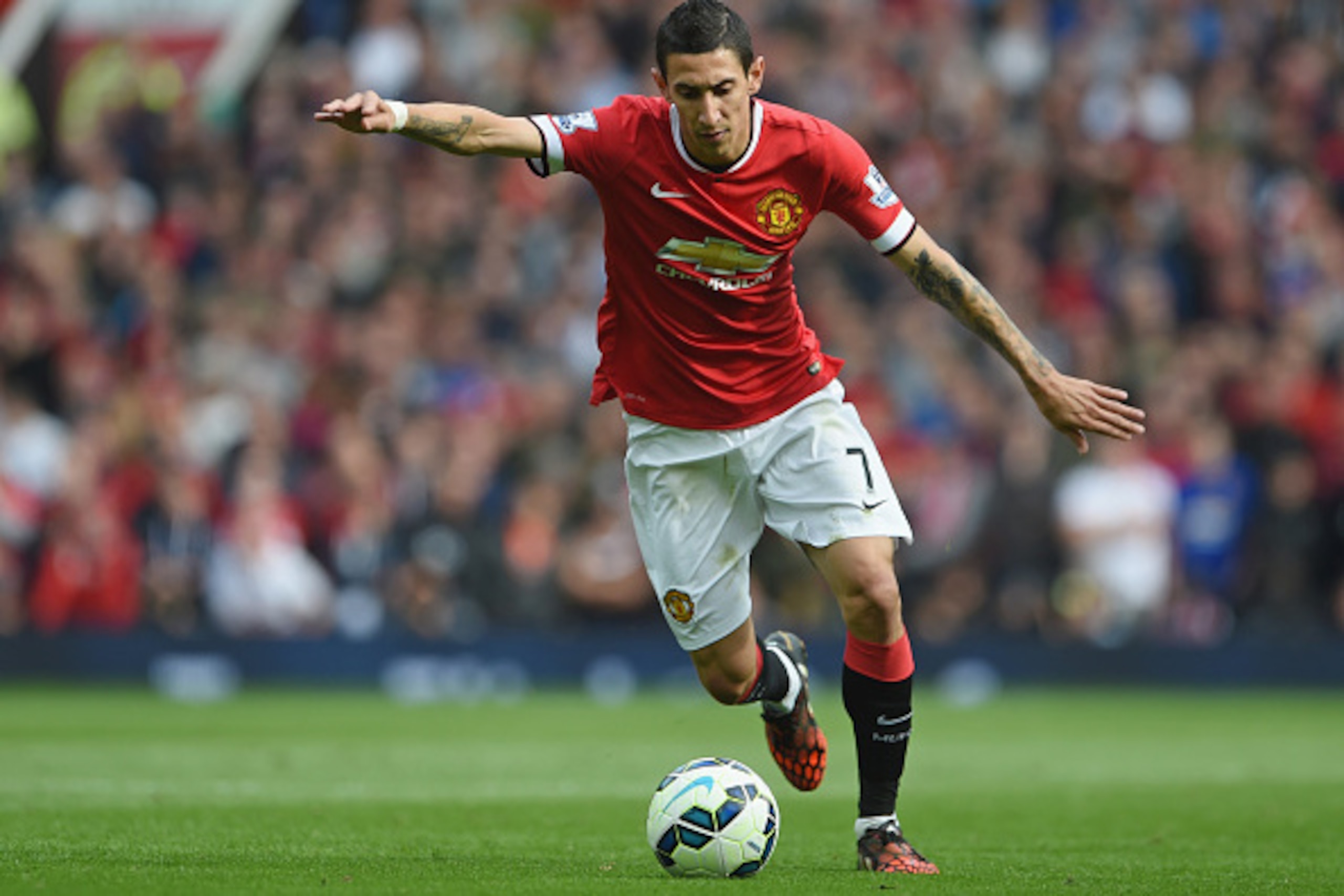 MANCHESTER, ENGLAND - OCTOBER 05: Angel Di Maria of Manchester United in action during the Barclays Premier League match between Manchester United and Everton at Old Trafford on October 5, 2014 in Manchester, England. (Photo by Michael Regan/Getty Image MANCHESTER, ENGLAND - OCTOBER 05: Angel Di Maria of Manchester United in action during the Barclays Premier League match between Manchester United and Everton at Old Trafford on October 5, 2014 in Manchester, England. (Photo by Michael Regan/Getty Image