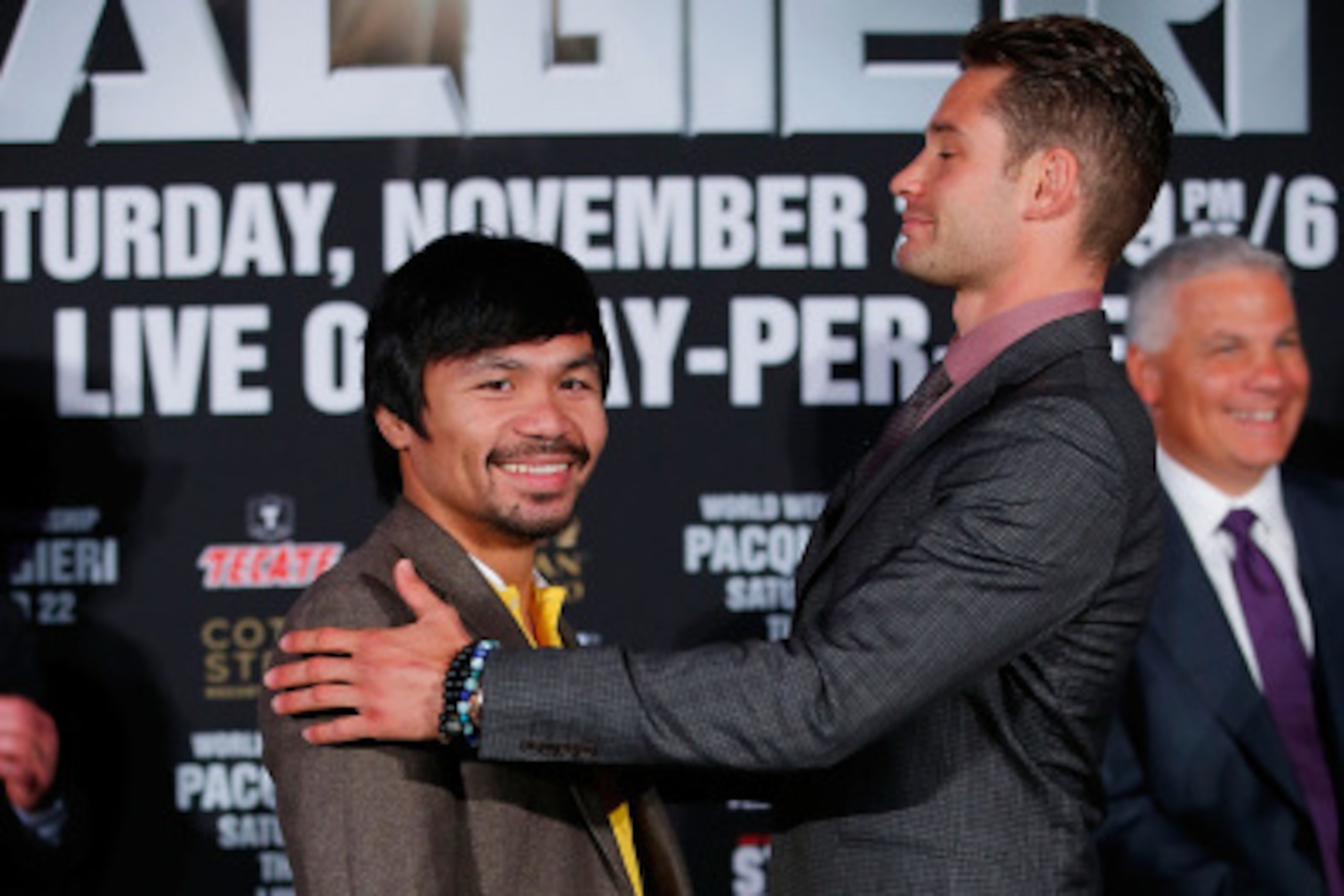 NEW YORK, NY - SEPTEMBER 04:  Manny Pacquiao and Chris Algieri attend the Manny Pacquiao v Chris Algieri Media Tour at The Liberty Theatre on September 4, 2014 in New York City.  (Photo by Joe Scarnici/Getty Images)