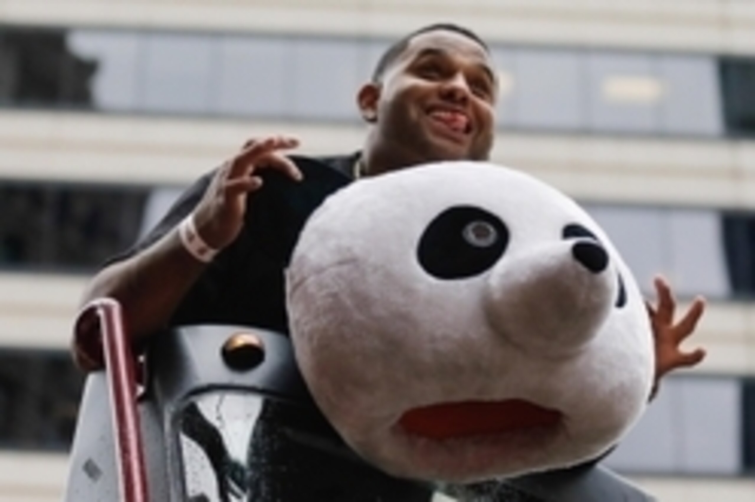 Oct 31, 2014; San Francisco, CA, USA; San Francisco Giants third baseman Pablo Sandoval (48) holds up a panda costume head during the World Series victory parade on Market Street. Mandatory Credit: Kelley L Cox-USA TODAY Sports
