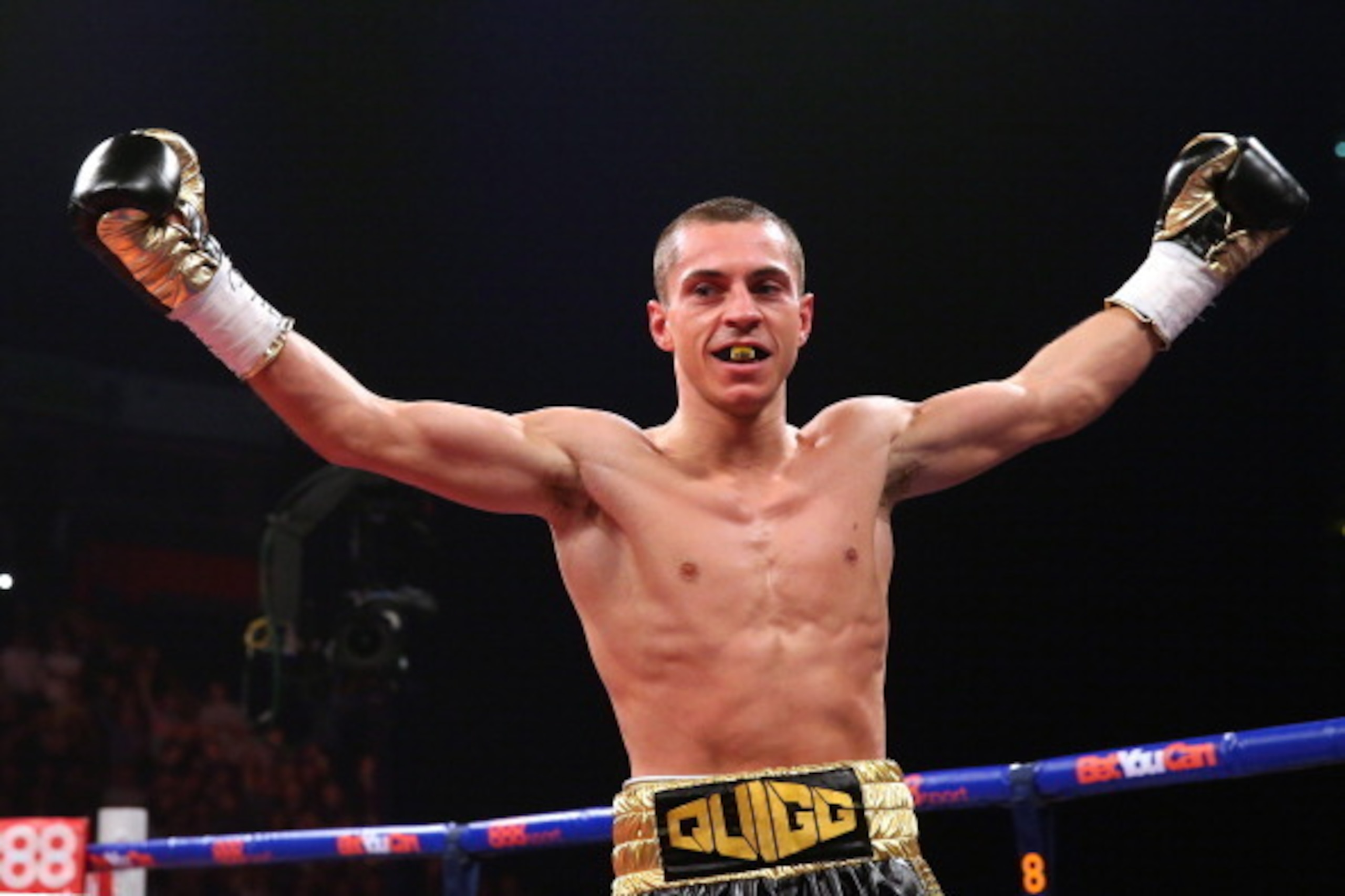 MANCHESTER, ENGLAND - APRIL 19:  Scott Quigg celebrates after knocking out Tshifhiwa Munyai during the WBA World Super Bantamweight Title fight between Scott Quigg and Tshifhiwa Munyai at MEN Arena on April 19, 2014 in Manchester, England.  (Photo by Alex
