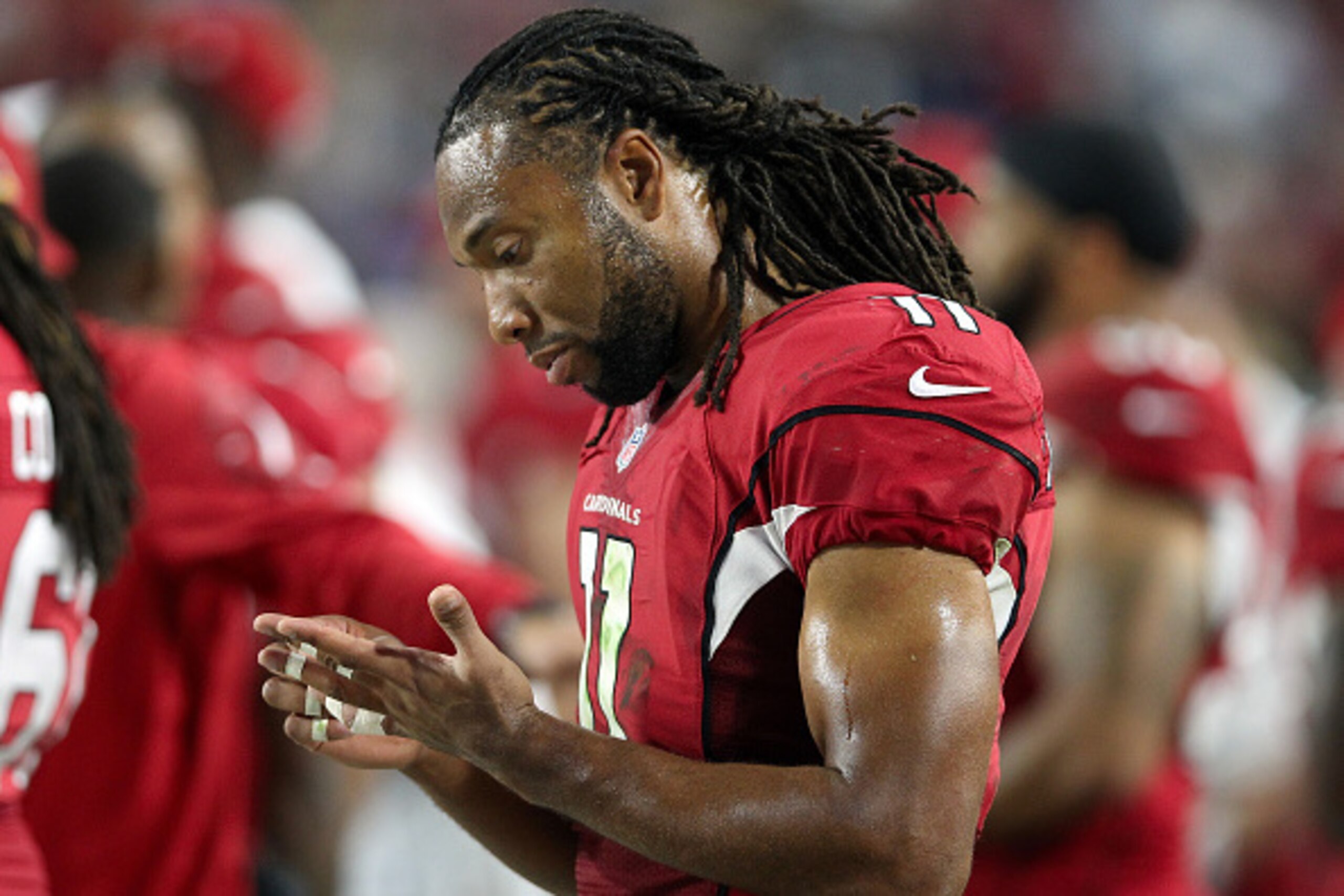 GLENDALE, AZ - NOVEMBER 16: Wide receiver Larry Fitzgerald #11 of the Arizona Cardinals on the sidelines during the NFL game against the Detroit Lions at the University of Phoenix Stadium on November 16, 2014 in Glendale, Arizona. The Cardinals defeated GLENDALE, AZ - NOVEMBER 16: Wide receiver Larry Fitzgerald #11 of the Arizona Cardinals on the sidelines during the NFL game against the Detroit Lions at the University of Phoenix Stadium on November 16, 2014 in Glendale, Arizona. The Cardinals defeated