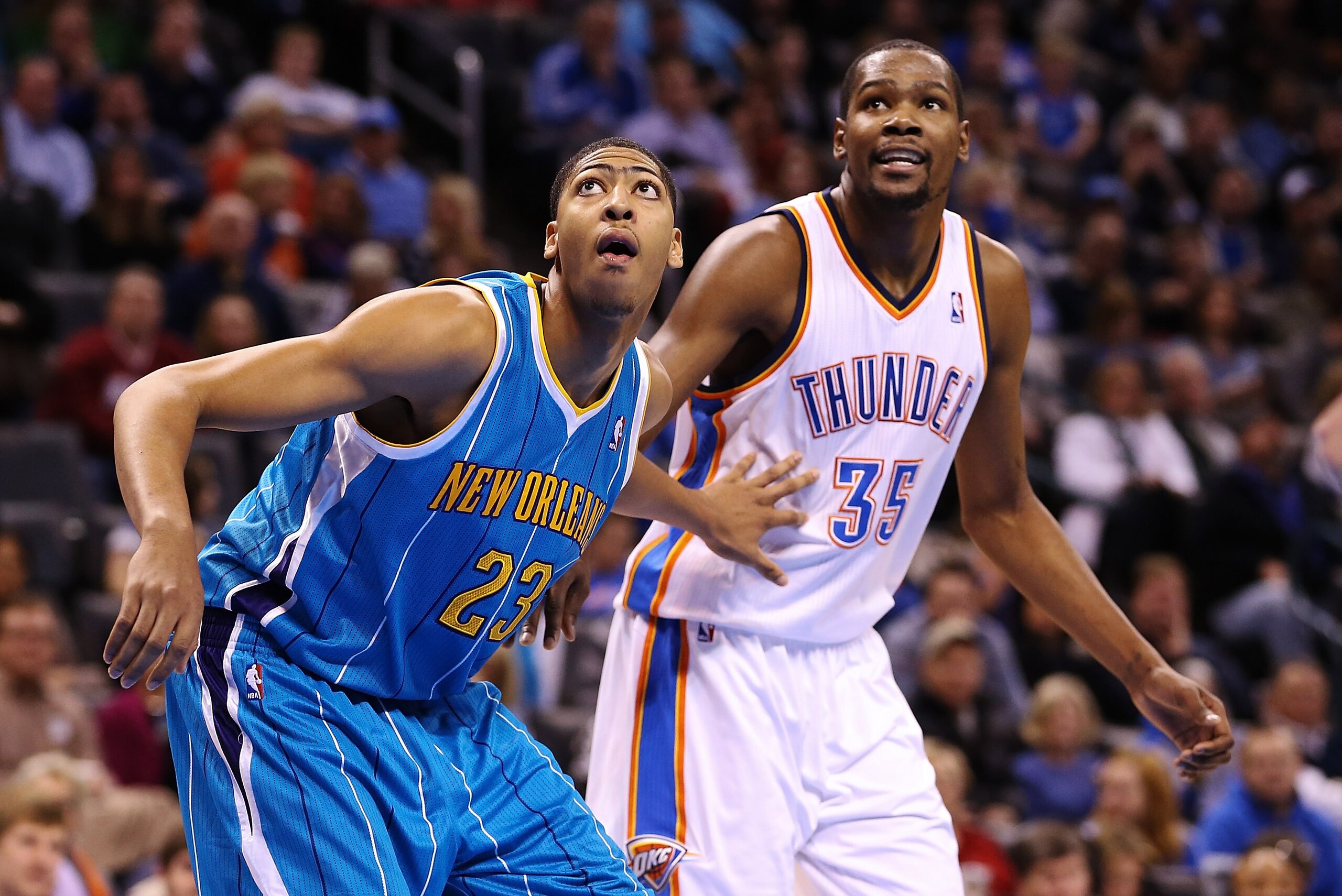 Dec 12, 2012; Oklahoma City, OK, USA; Oklahoma City Thunder small forward Kevin Durant (35) battles for a rebound with New Orleans Hornets power forward Anthony Davis (23) during the second half at Chesapeake Energy Arena. Mandatory Credit: Kevin Jairaj-U