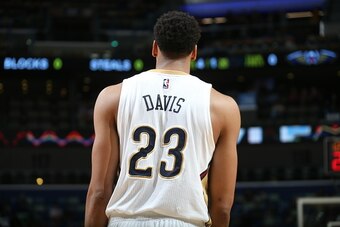 NEW ORLEANS, LA - OCTOBER 14:  Anthony Davis #23 of the New Orleans Pelicans looks on during the game against the Houston Rockets at the Smoothie King Center on October 14, 2014 in New Orleans, Louisiana. NOTE TO USER: User expressly acknowledges and agre