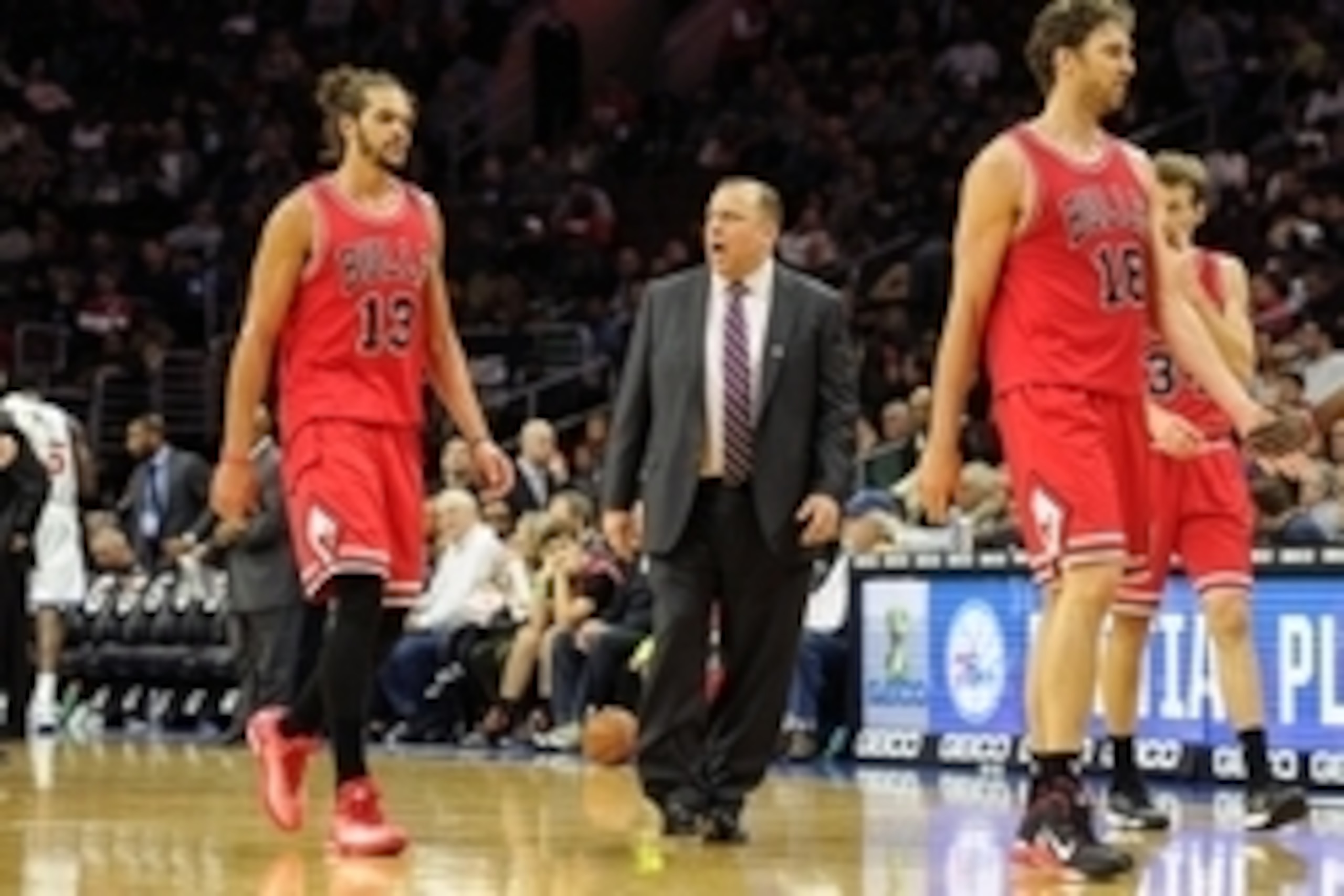 Nov 7, 2014; Philadelphia, PA, USA; Chicago Bulls head coach Tom Thibodeau talks to Chicago Bulls center Joakim Noah (13) during the second quarter against the Philadelphia 76ers at the Wells Fargo Center. Mandatory Credit: John Geliebter-USA TODAY Sports
