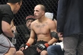 Jan 25, 2014; Chicago, IL, USA; Chico Camus (red gloves) between rounds in a fight against Yaotzin Meza (not pictured) during UFC on FOX 10 at the United Center. Mandatory Credit: David Banks-USA TODAY Sports
