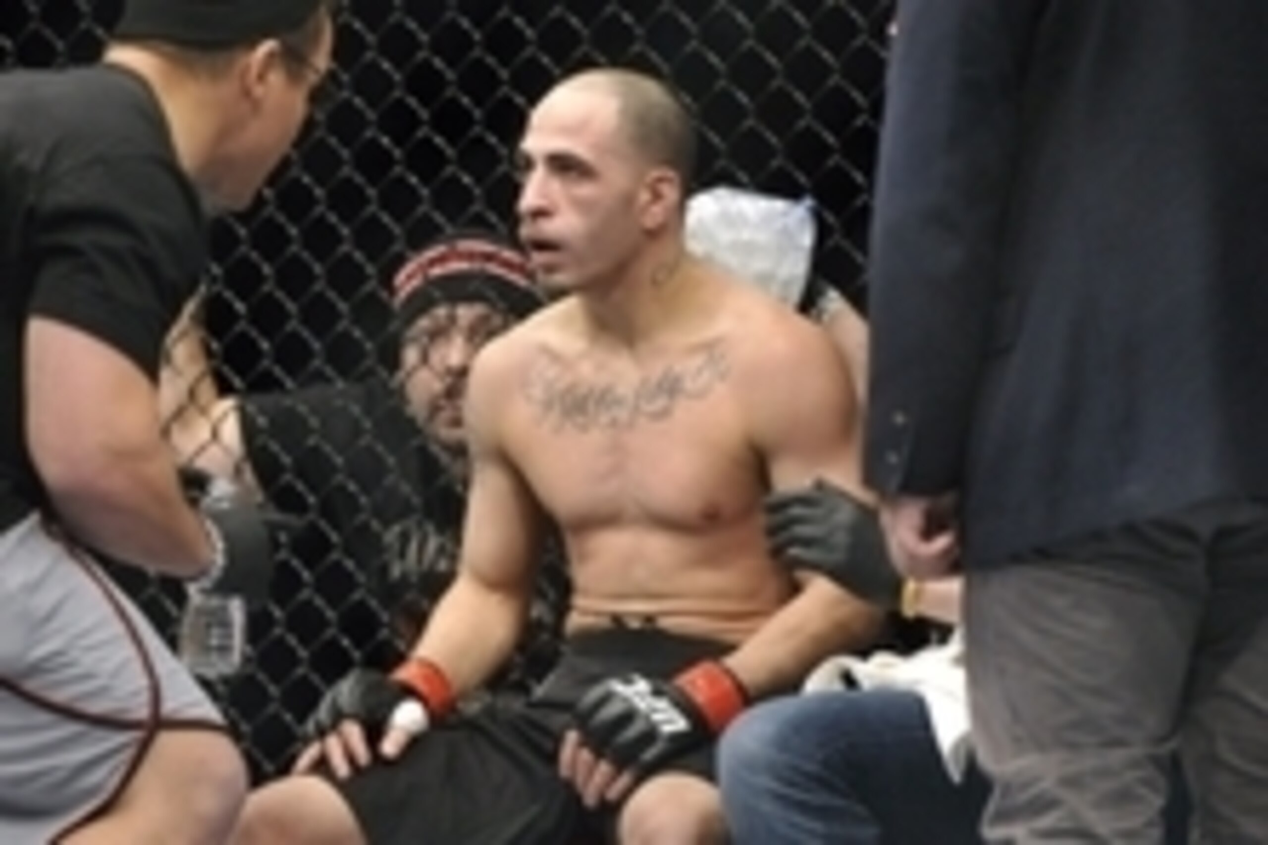 Jan 25, 2014; Chicago, IL, USA; Chico Camus (red gloves) between rounds in a fight against Yaotzin Meza (not pictured) during UFC on FOX 10 at the United Center. Mandatory Credit: David Banks-USA TODAY Sports