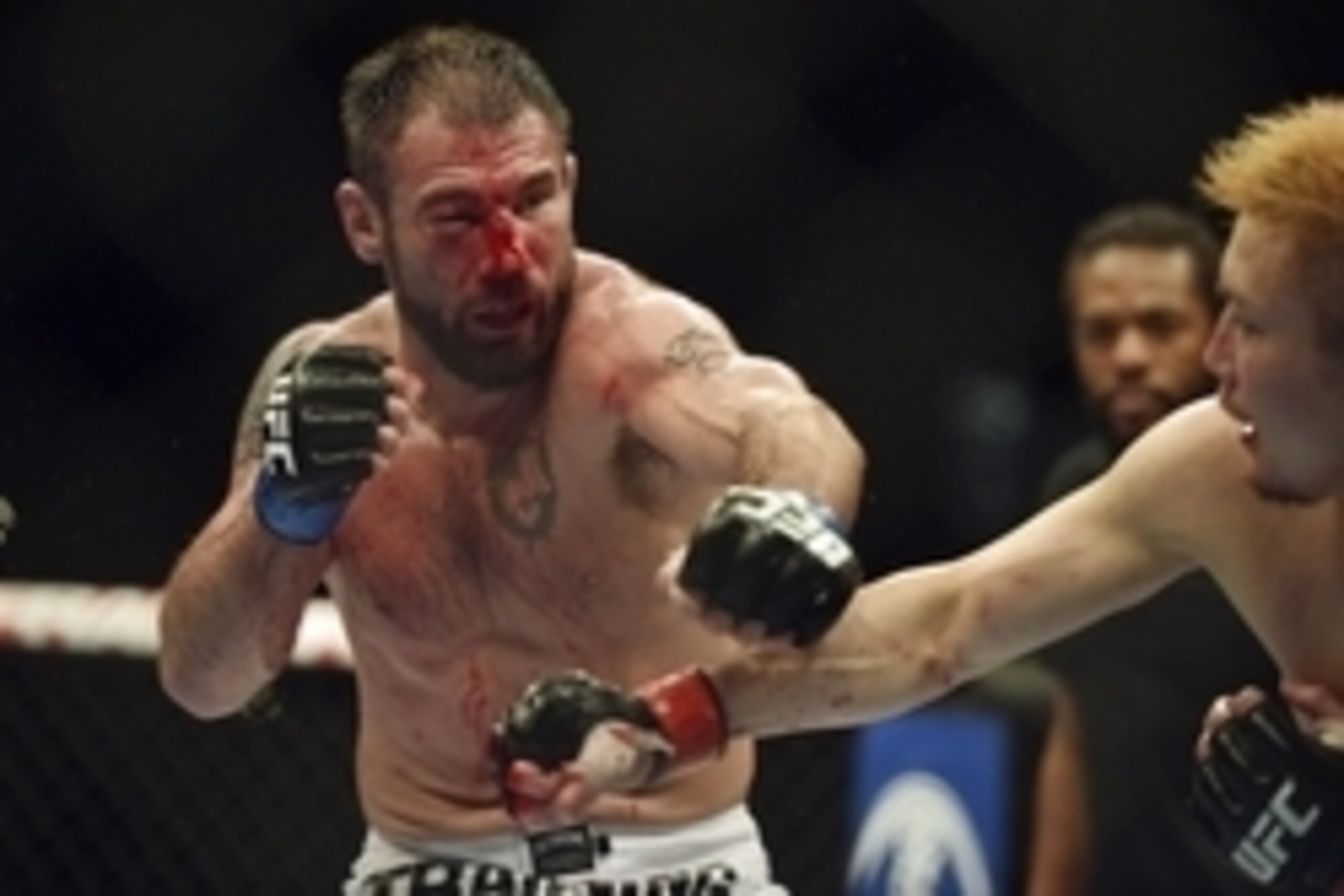 Apr 26, 2014; Baltimore, MD, USA;  Issac Vallie-Flagg (blue gloves) fights against Takanori Gomi (red gloves) during UFC 172 at  Baltimore Arena. Mandatory Credit: Tommy Gilligan-USA TODAY Sports