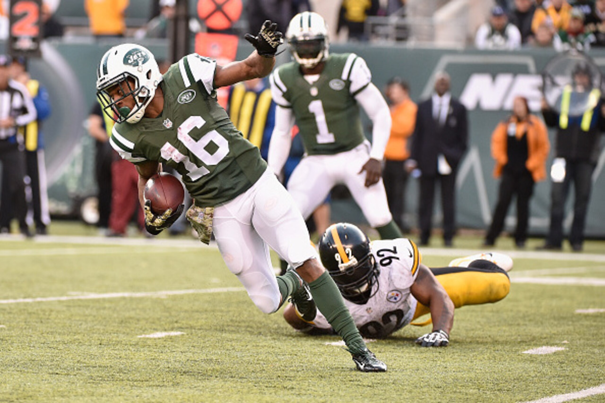 EAST RUTHERFORD, NJ - NOVEMBER 03:  Percy Harvin #16 of the New York Jets runs against  James Harrison #92 of the Pittsburgh Steelers during their game at MetLife Stadium on November 3, 2014 in East Rutherford, New Jersey.  (Photo by Al Bello/Getty Images